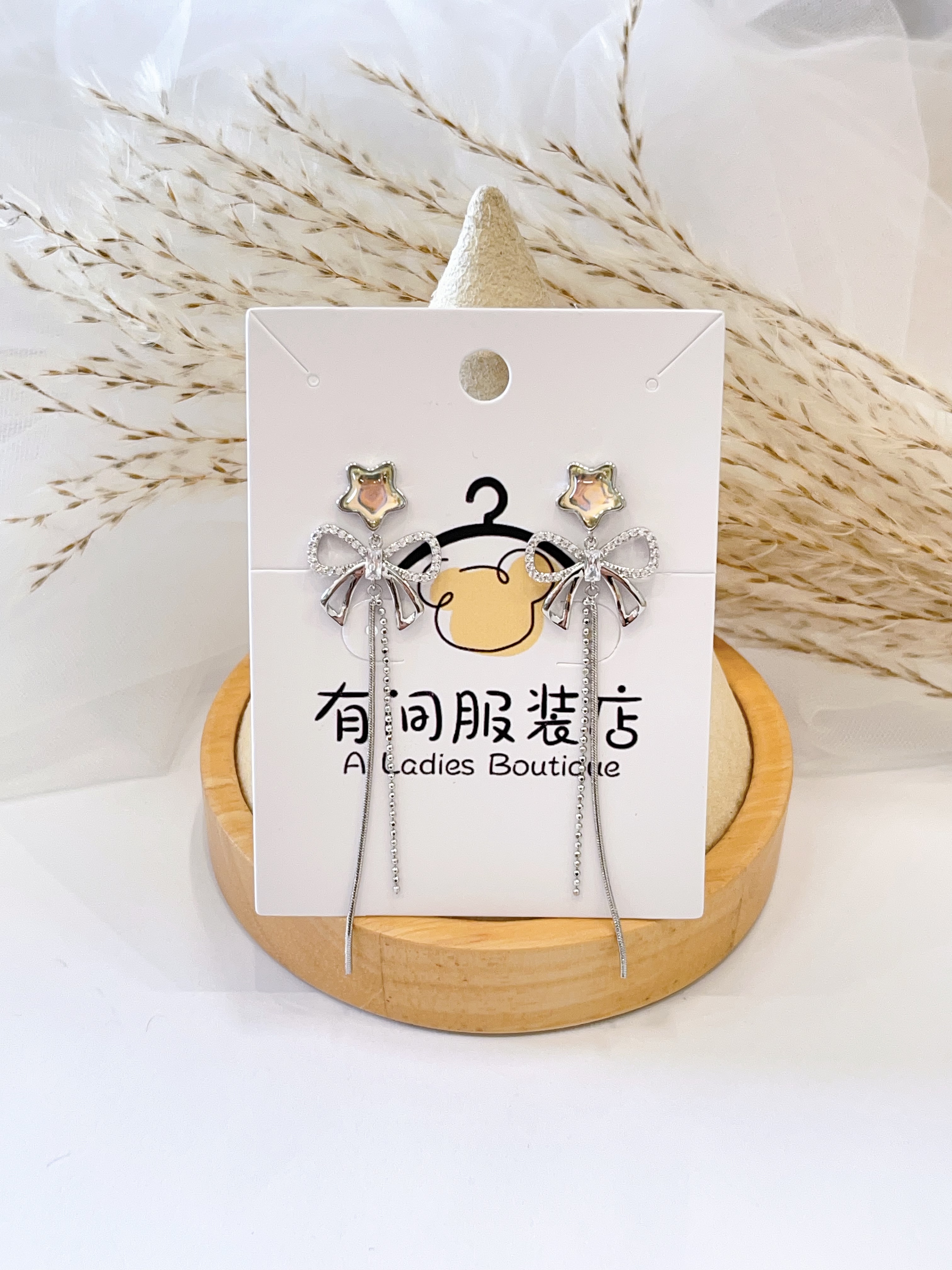 温柔星星蝴蝶结流苏耳环