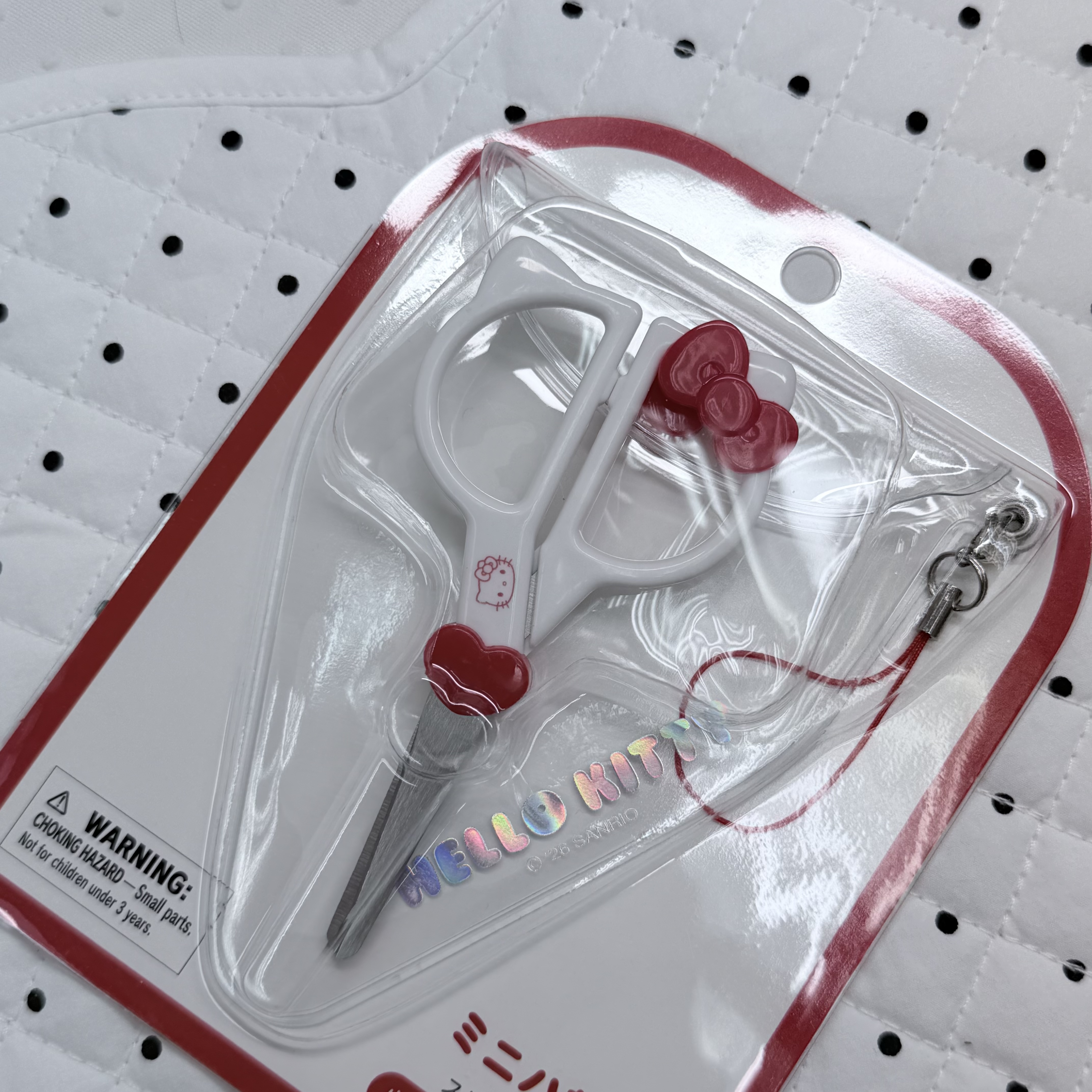 Kitty 較剪電話繩