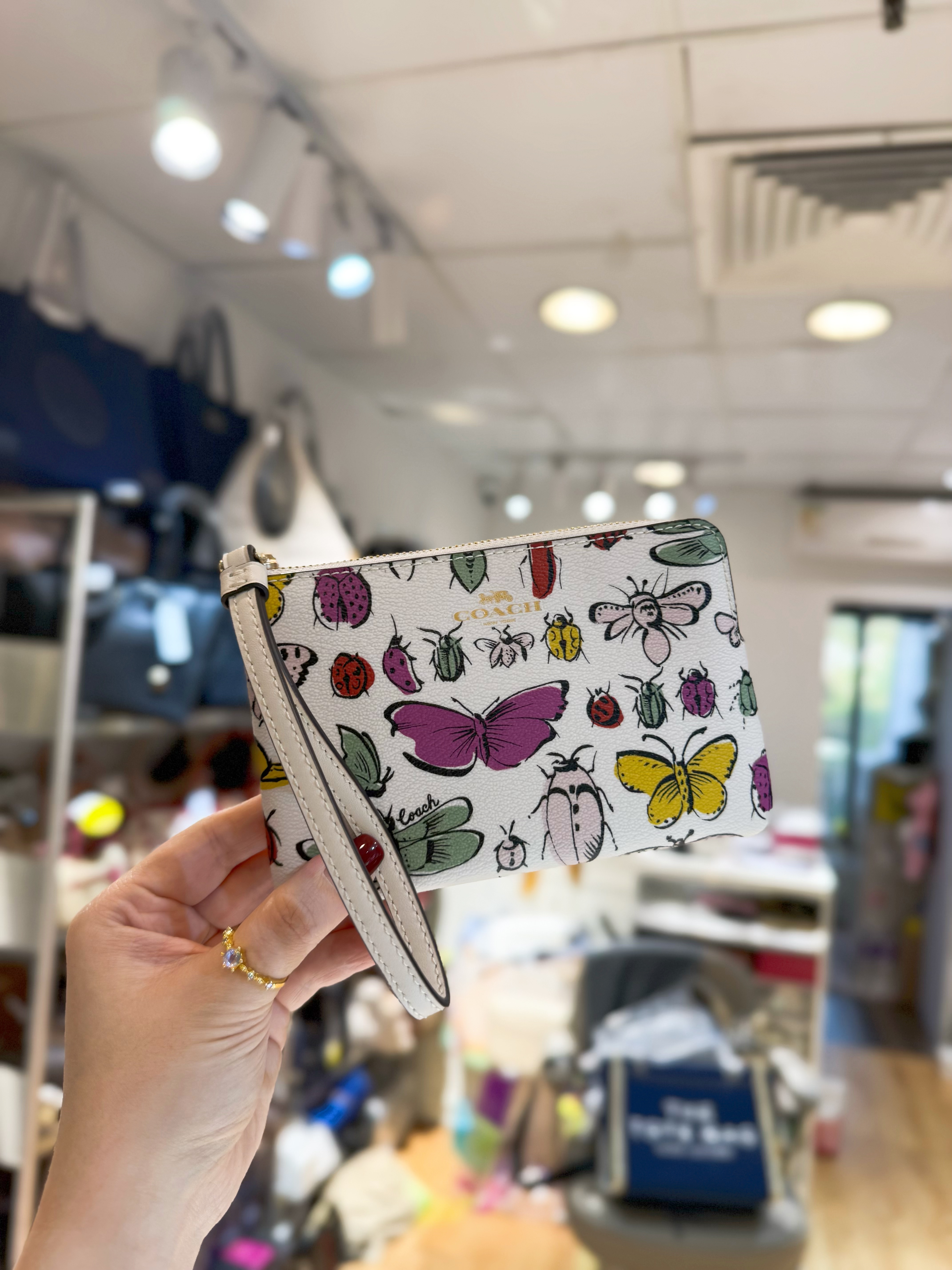 Coach wristlet w/butterfly