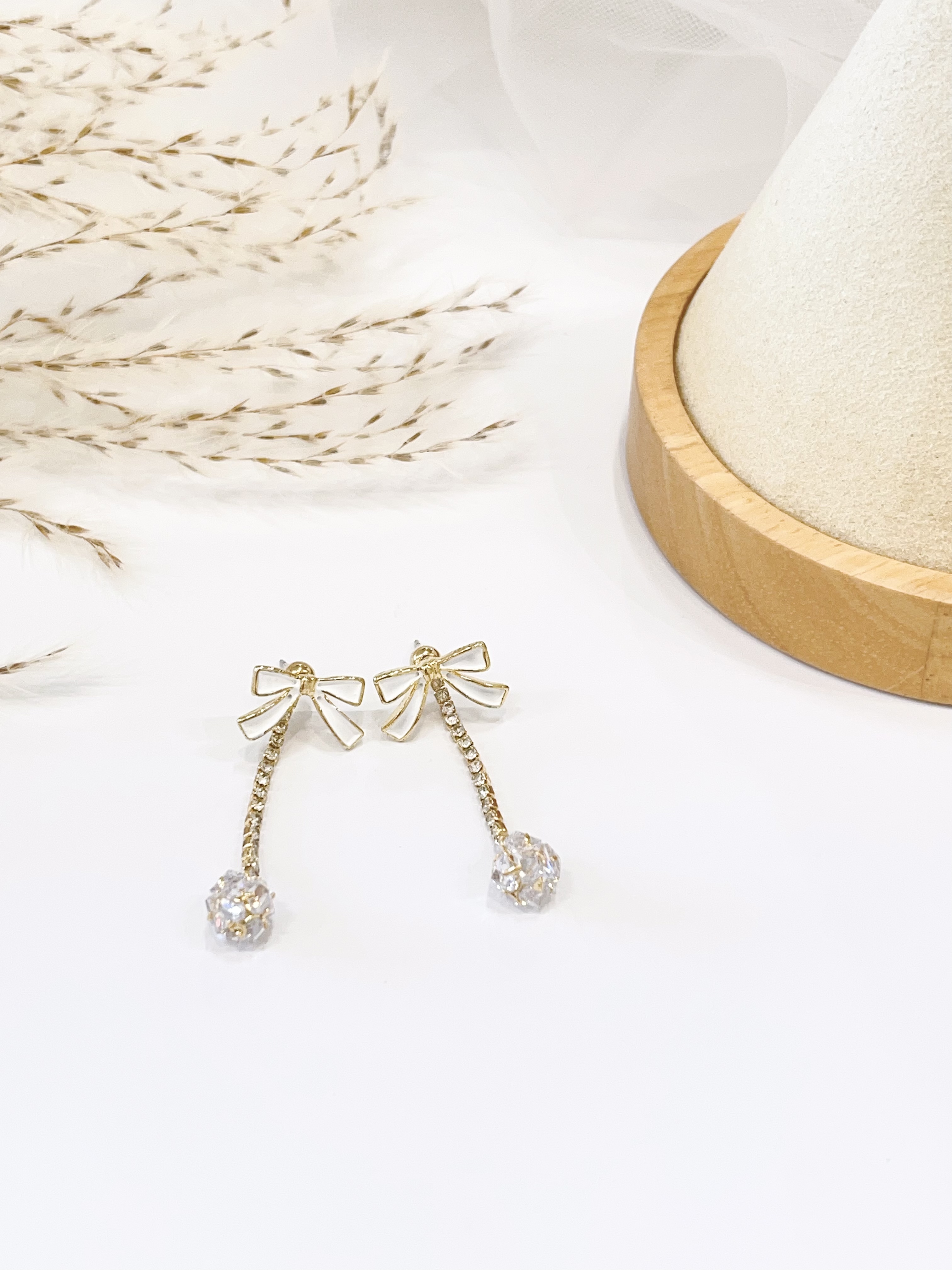 超闪钻球蝴蝶结长流苏耳环