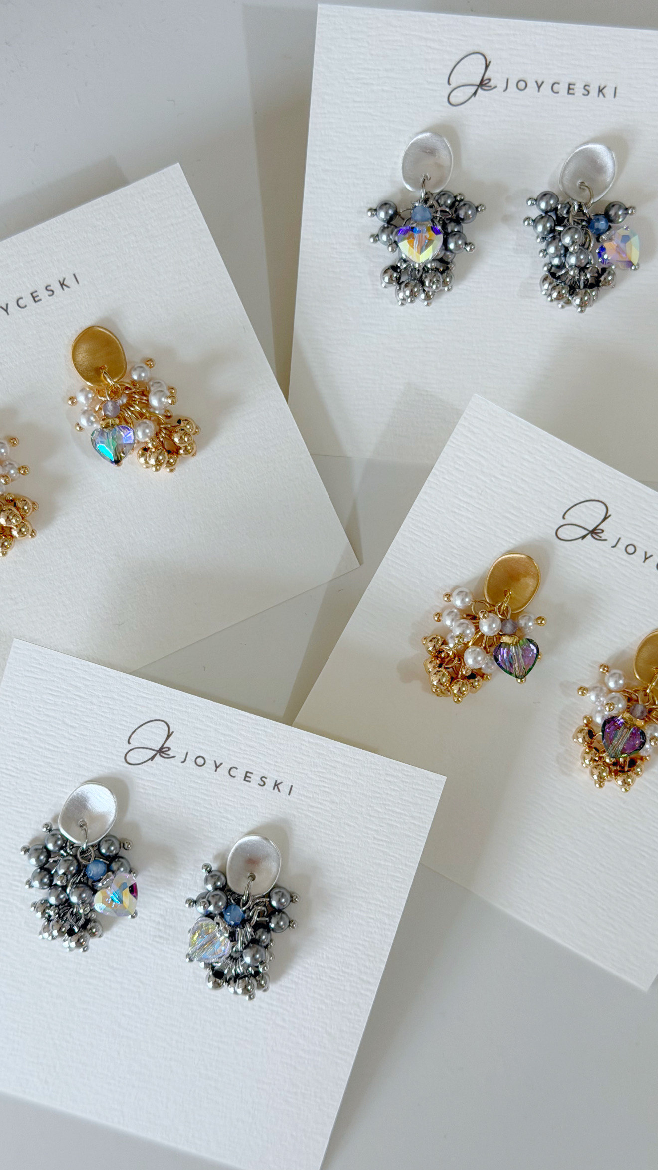 幻彩紫愛心流穗波波球長款耳環/ 白珍珠x金色($198)