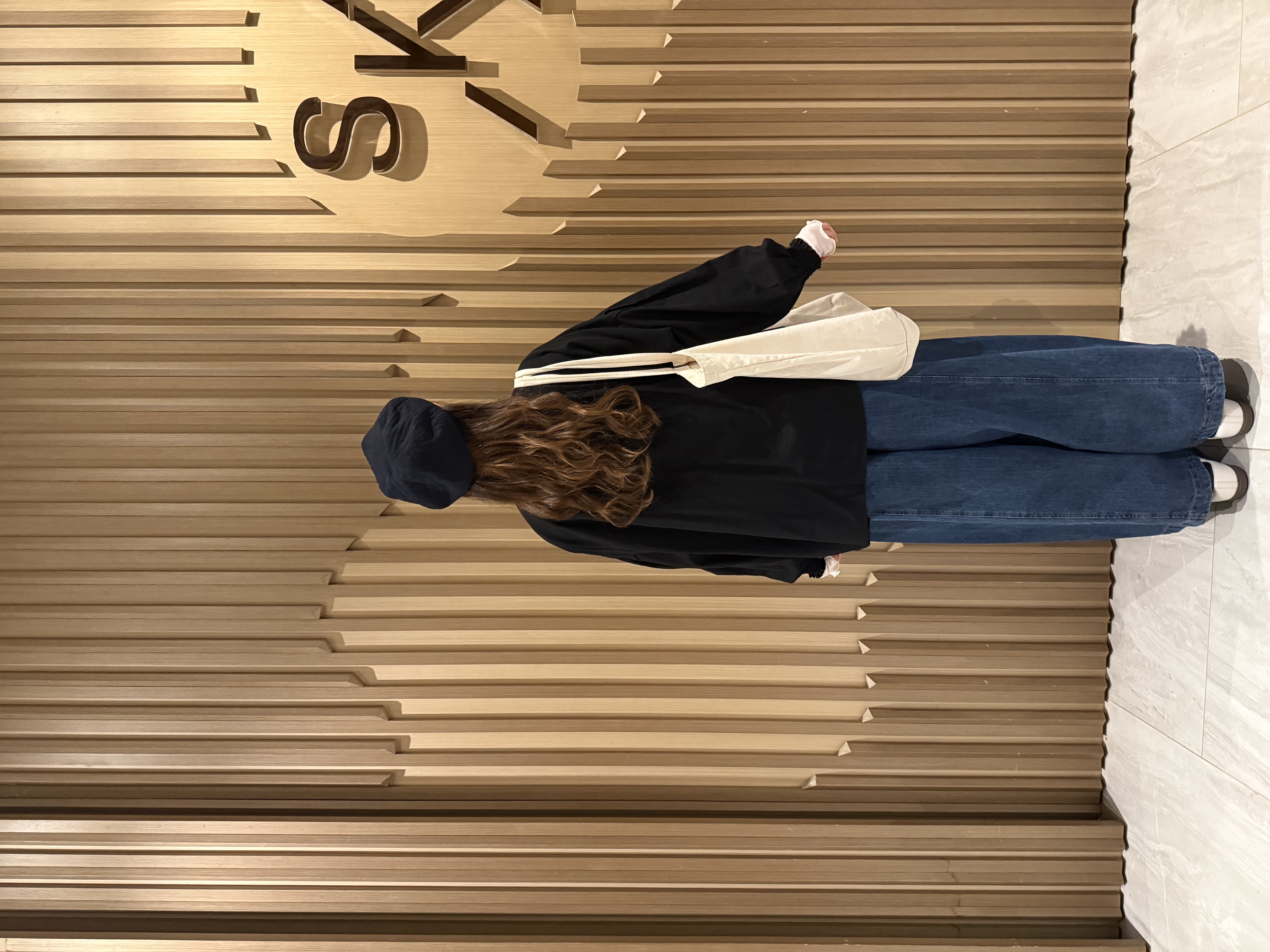 洗水彎刀牛仔褲