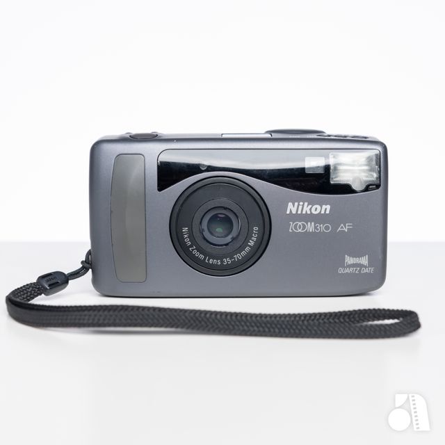 Nikon／ZOOM310 く AF。電池／CR123A。【カバー付き 中古品】。