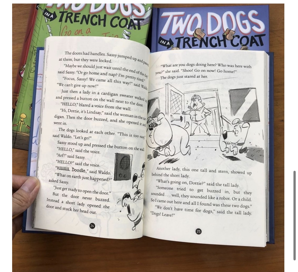1. TWO DOGS IN A TRENCH COAT GO TO SCHOOL 2. TWO DOGS IN A TRENCH COAT START A CLUB BY ACCIDENT 3. TWO DOGS IN A TRENCH COAT AND THE LITTLE CAR WITH THE BIG PROBLEM（這本在第三層） 4. TWO DOGS IN A TRENCH COAT ENTER STAGE LEFT