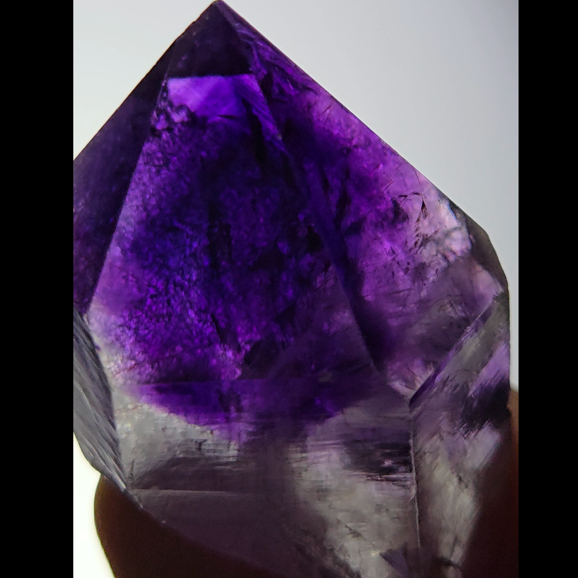 Blue amethyst point with phantom pyramid inclusions - AM143