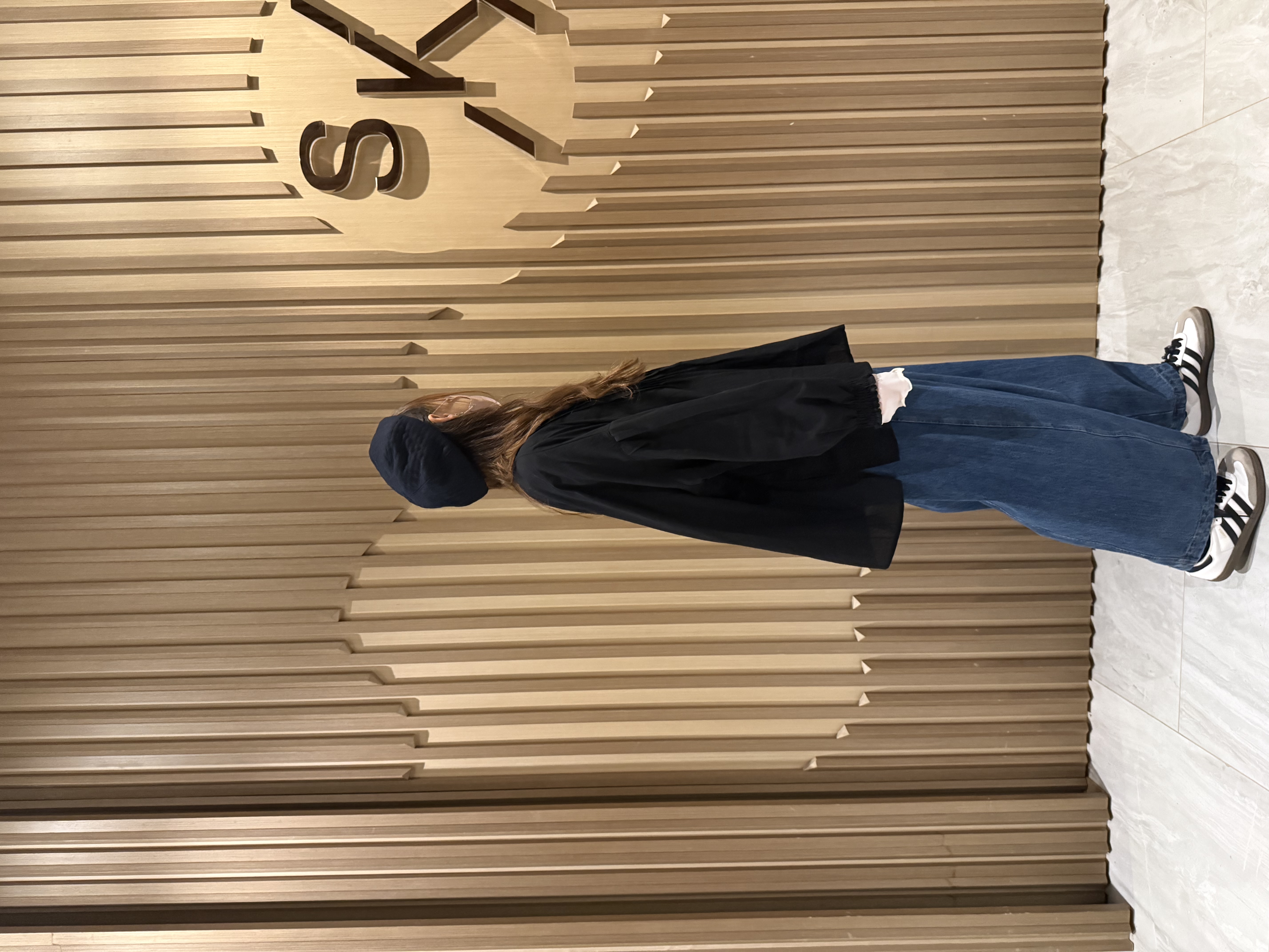 洗水彎刀牛仔褲