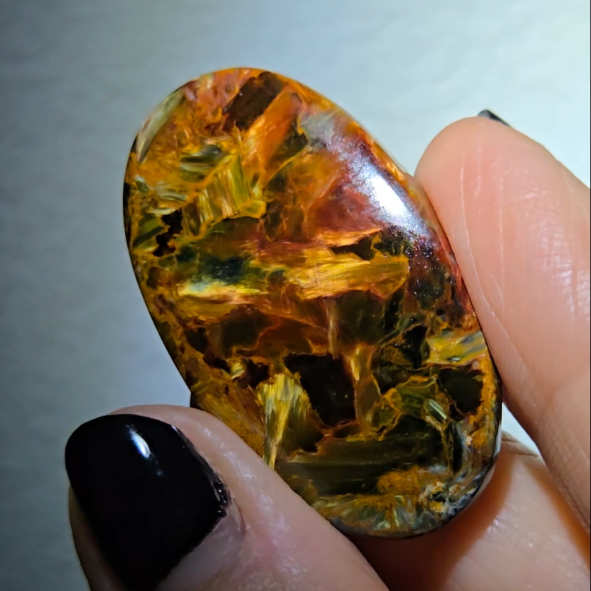 Red, blue and gold pietersite cabochon from Namibia - PT8