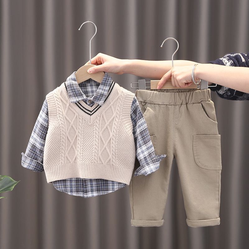563005 | Stylish Boys' Plaid Shirt and Sweater Vest Outfit with Khaki Pants