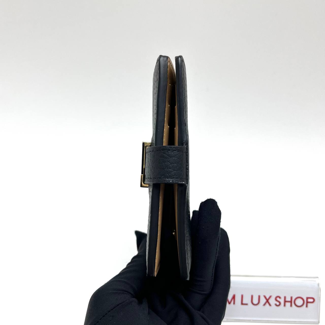 LV Capucines Vertical Compact Wallet