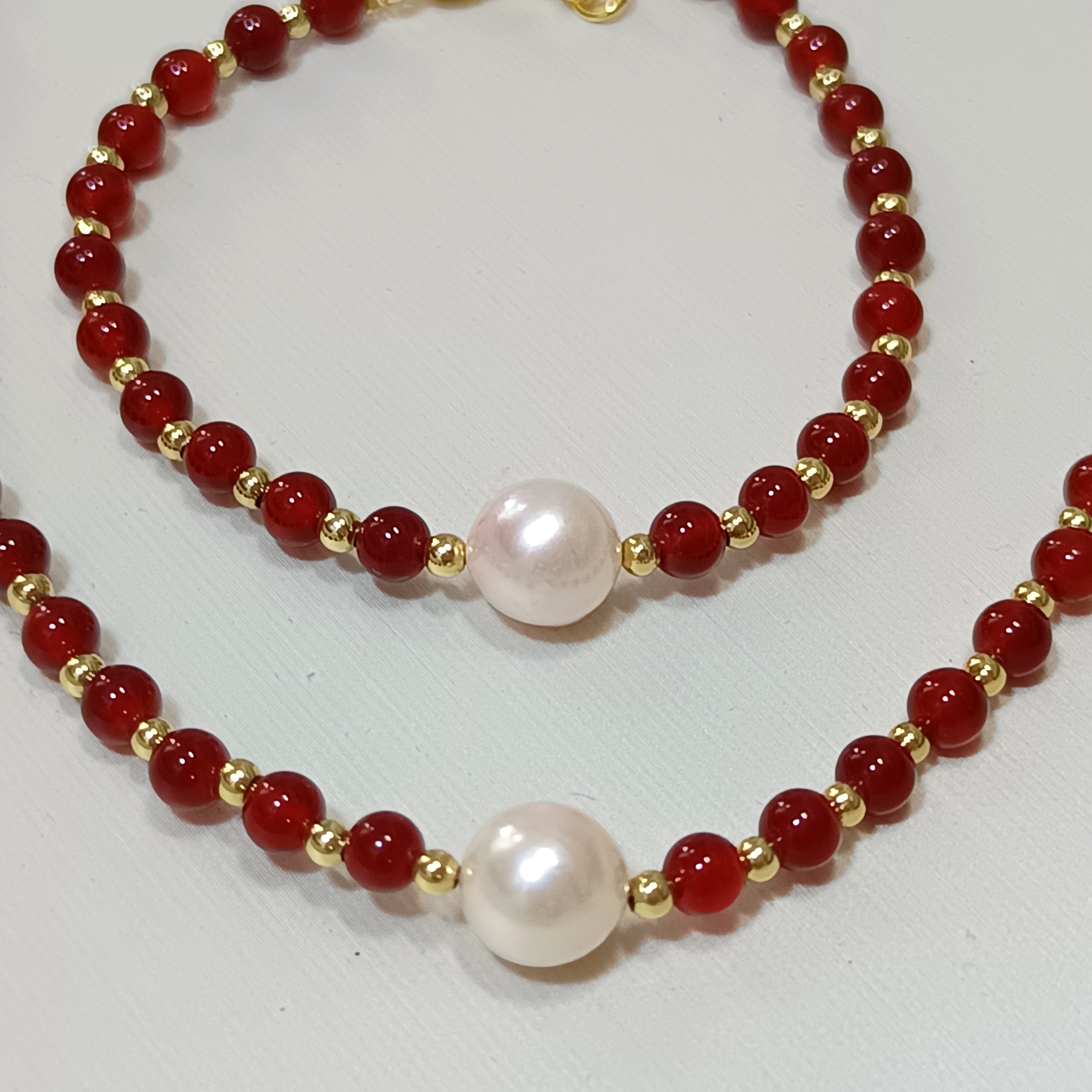 正圓極強光日本akoya櫻花粉海水珍珠+紅瑪瑙注金尾鍊扣項鍊手鍊套裝