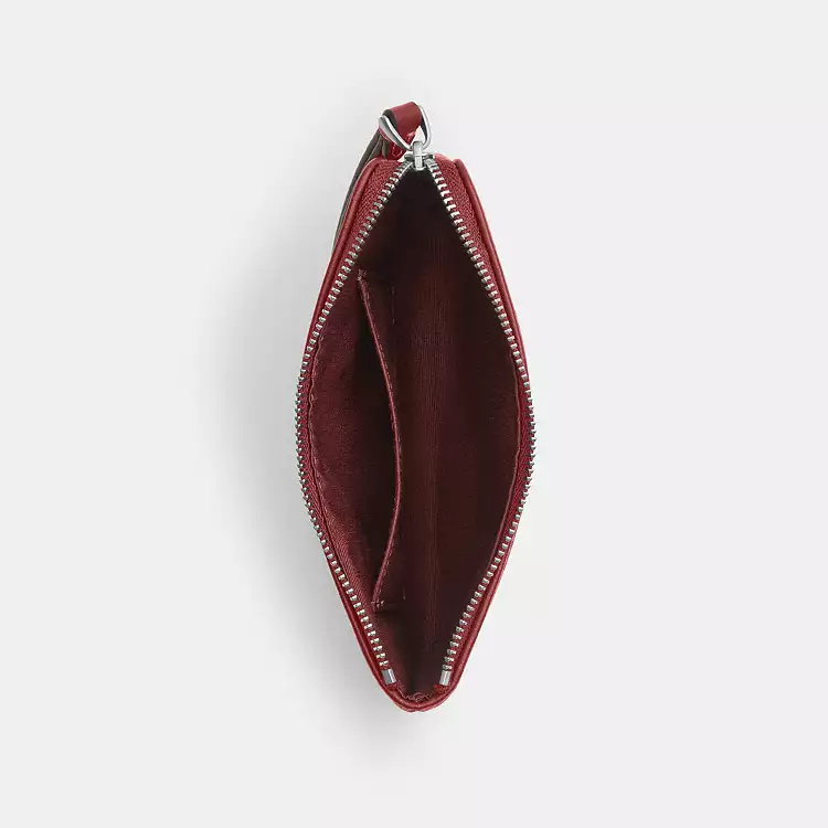 ✈️🇨🇦🇺🇸牛仔布❤️紅色Signature C  pattern Coach Outlet 拉鍊包現貨💝💝