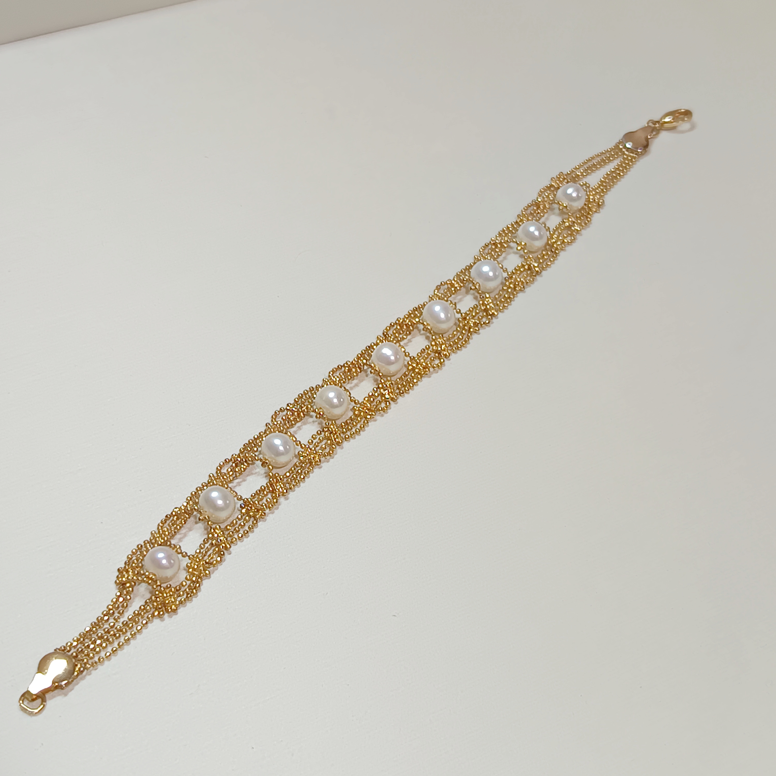 特價品‼️近正圓強光淡水無核珍珠注金蕾絲手鍊