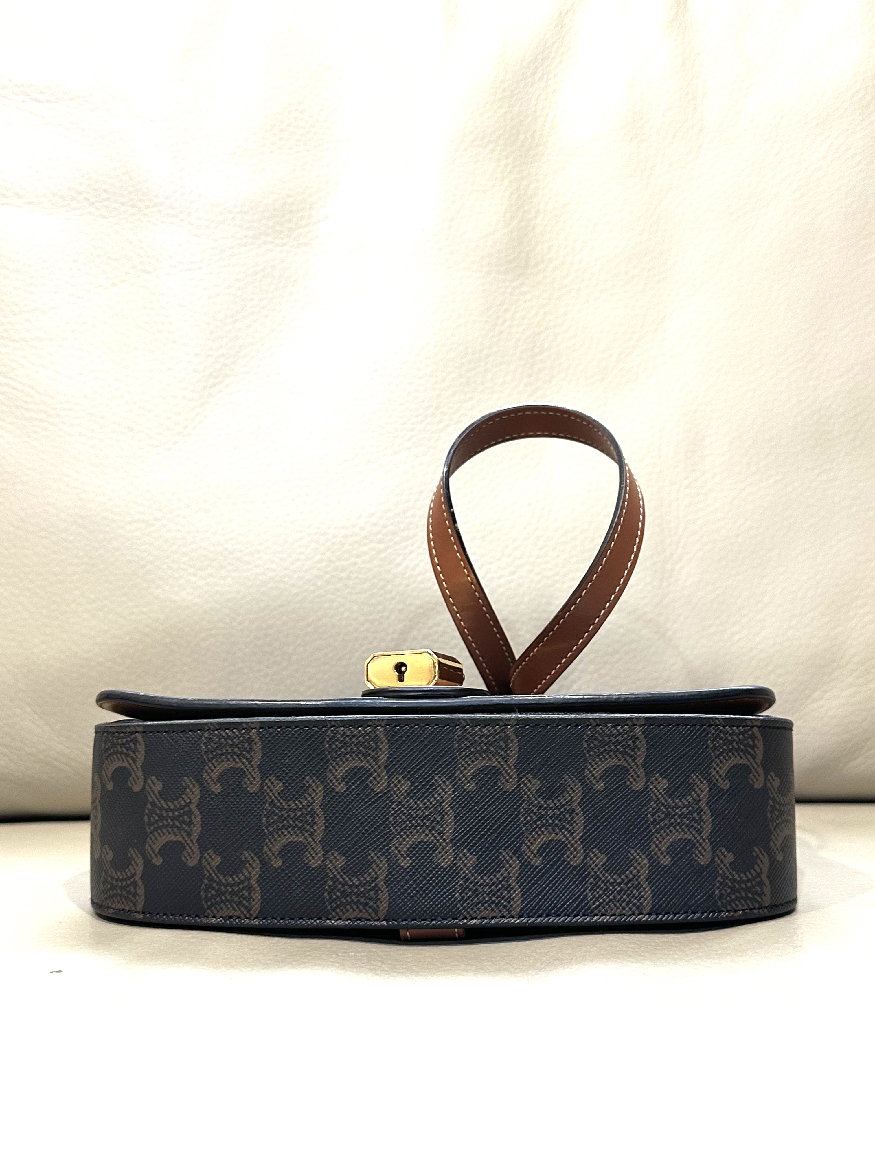 Pre-owned Celine Triomphe Canvas Clutch on Strap Tabou / Product Code: 26040503