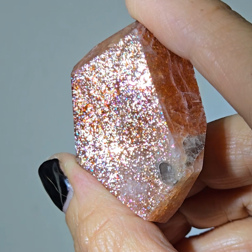 Arusha sunstone with rainbow glitter, smoky quartz inclusions - SM61