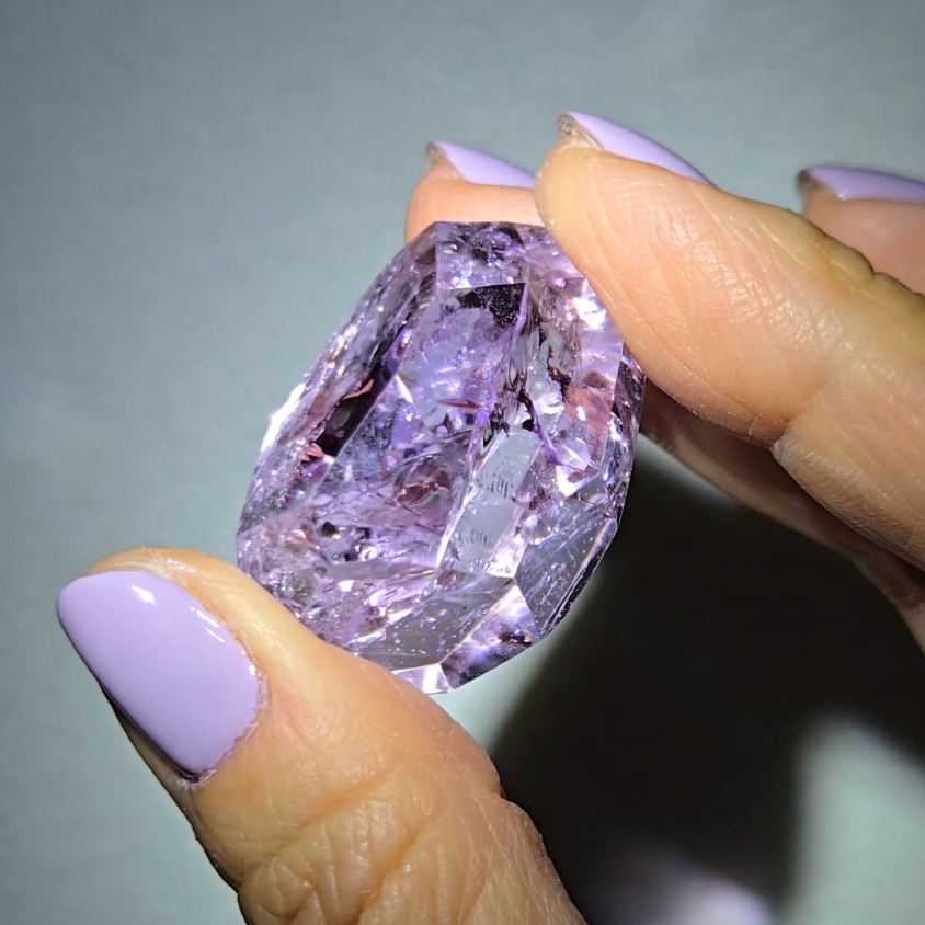 Amethyst pocket stone with rainbows and clarity - AM67