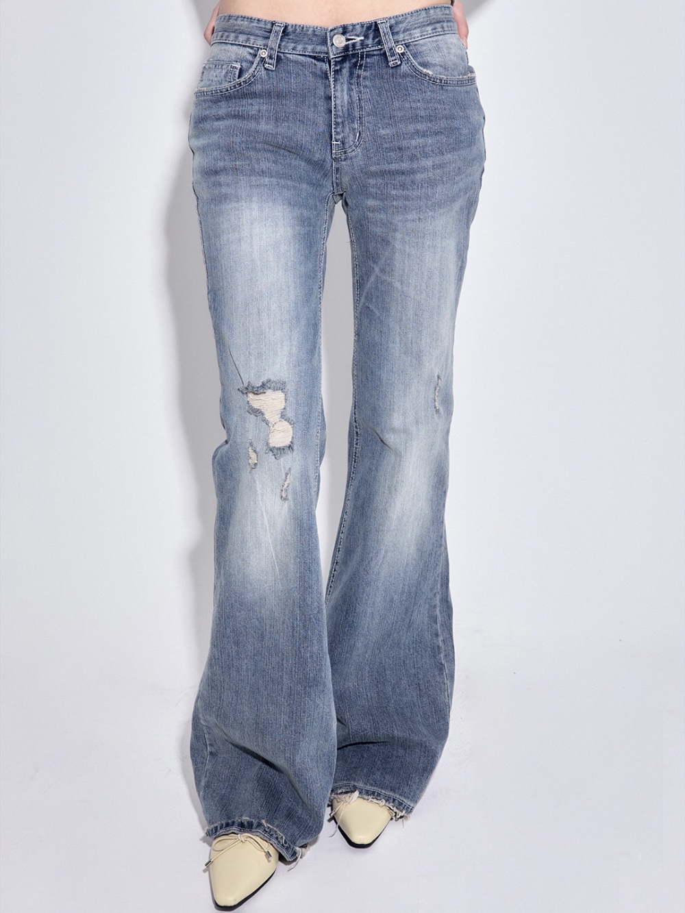 Low-Rise Distressed Bootcut Denim