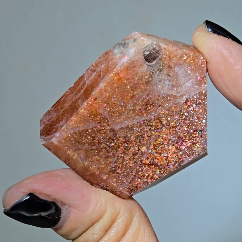 Arusha sunstone with rainbow glitter, smoky quartz inclusions - SM61
