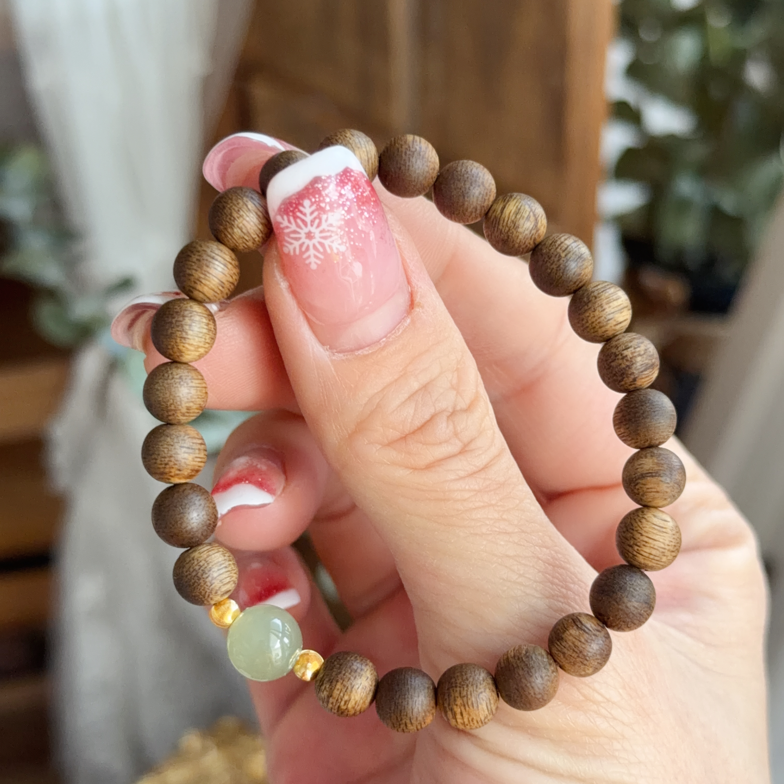 999足金襯6mm越南沉香手串