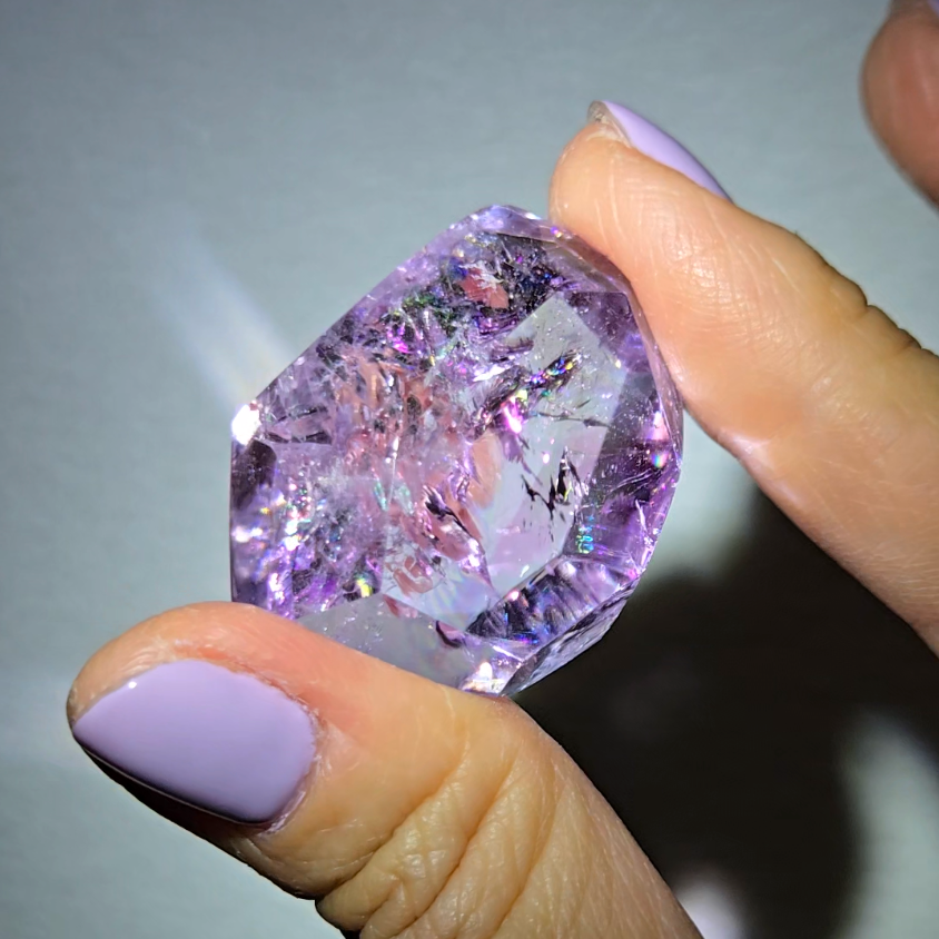 Amethyst pocket stone with rainbows and clarity - AM67