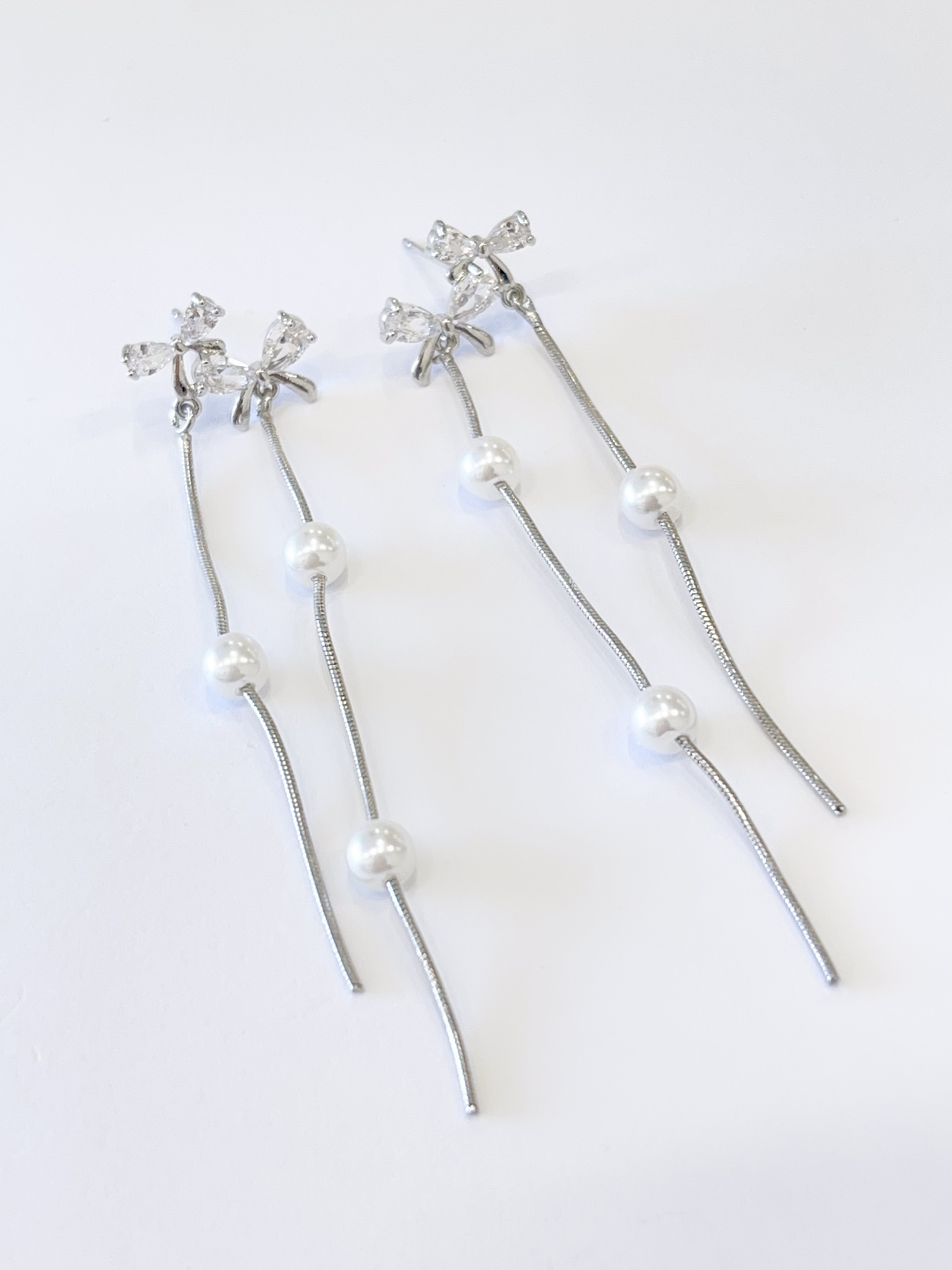 温柔风双蝴蝶结珍珠流苏耳环