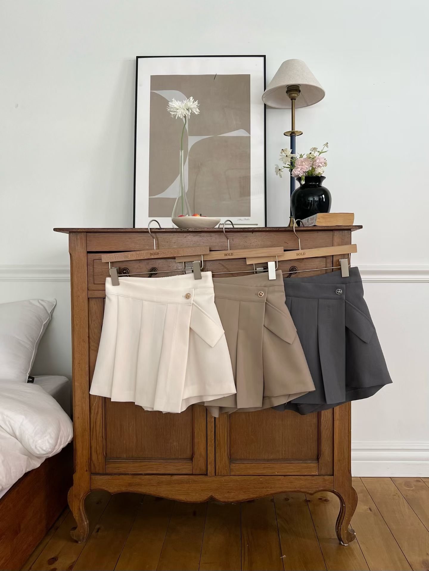 B7 側扣設計百褶 A 字褲裙