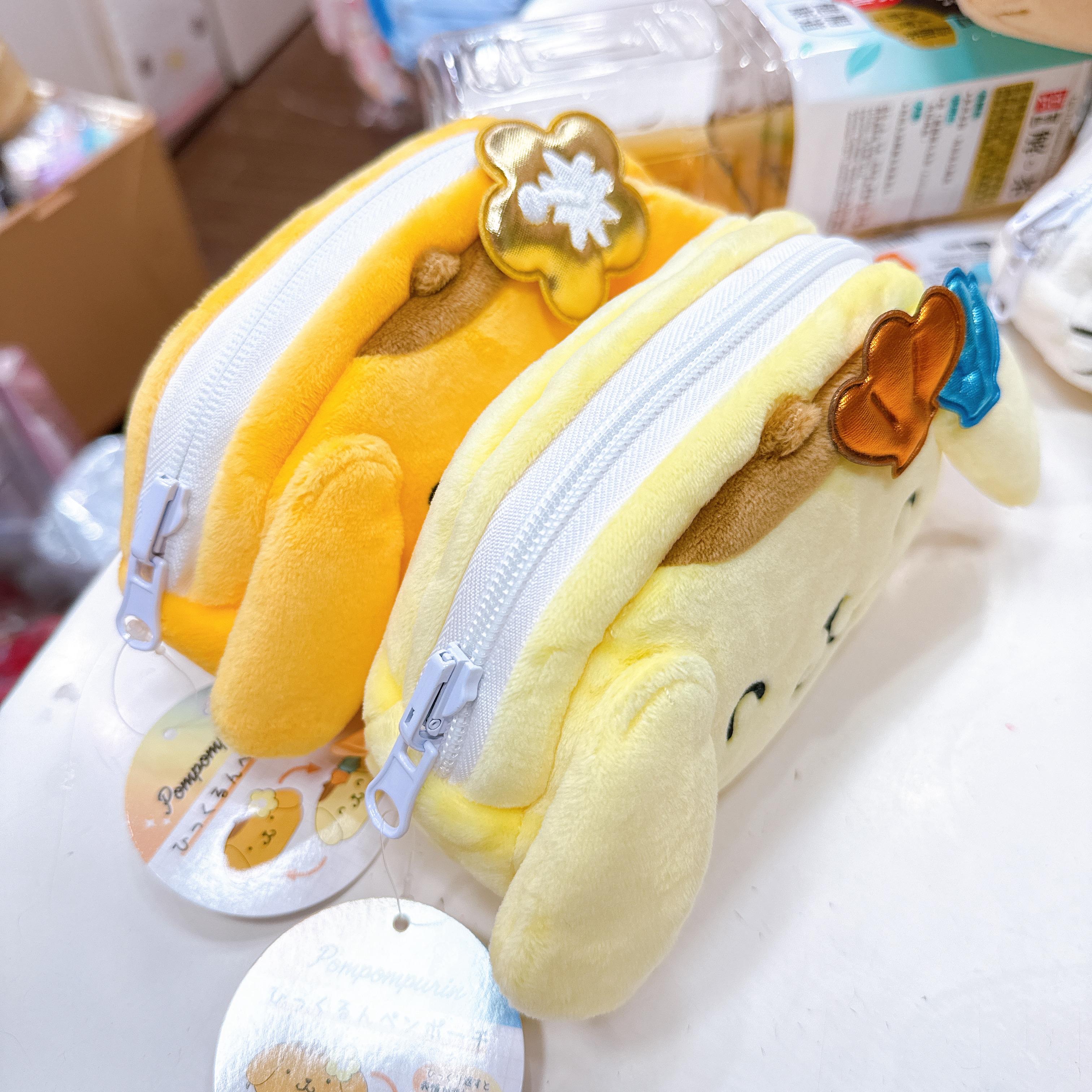 日本直送Hello Kitty布甸狗黑皮系列雙面化妝袋