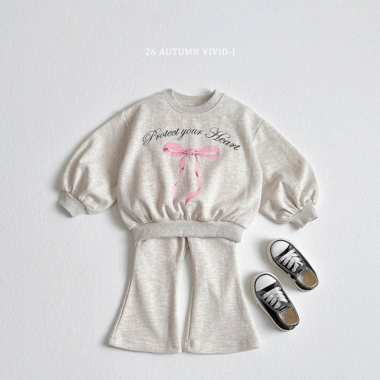 Vivid | Pink ribbon up and down