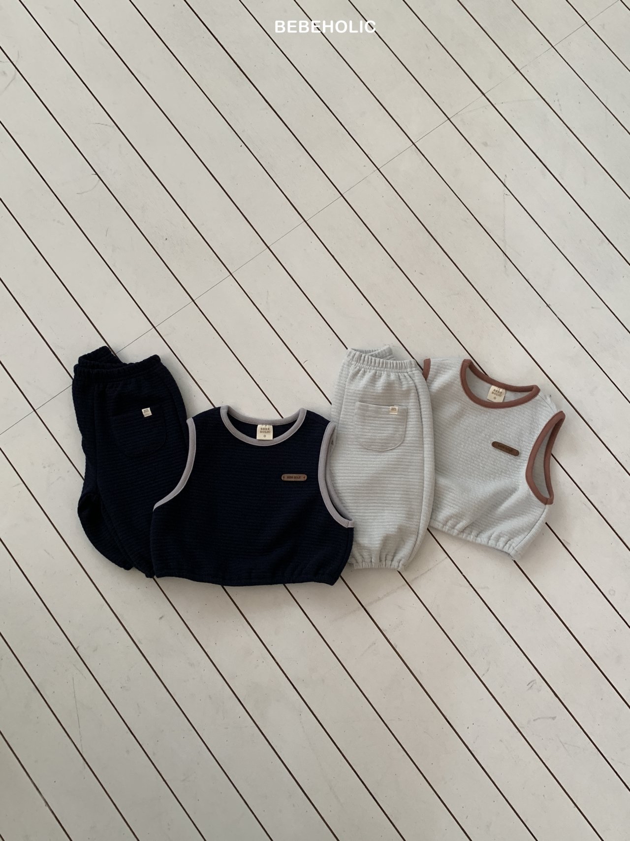 🌸預訂 韓國直送🌸🇰🇷BEBEHOLIC兩色皮革章撞色背心上下套裝