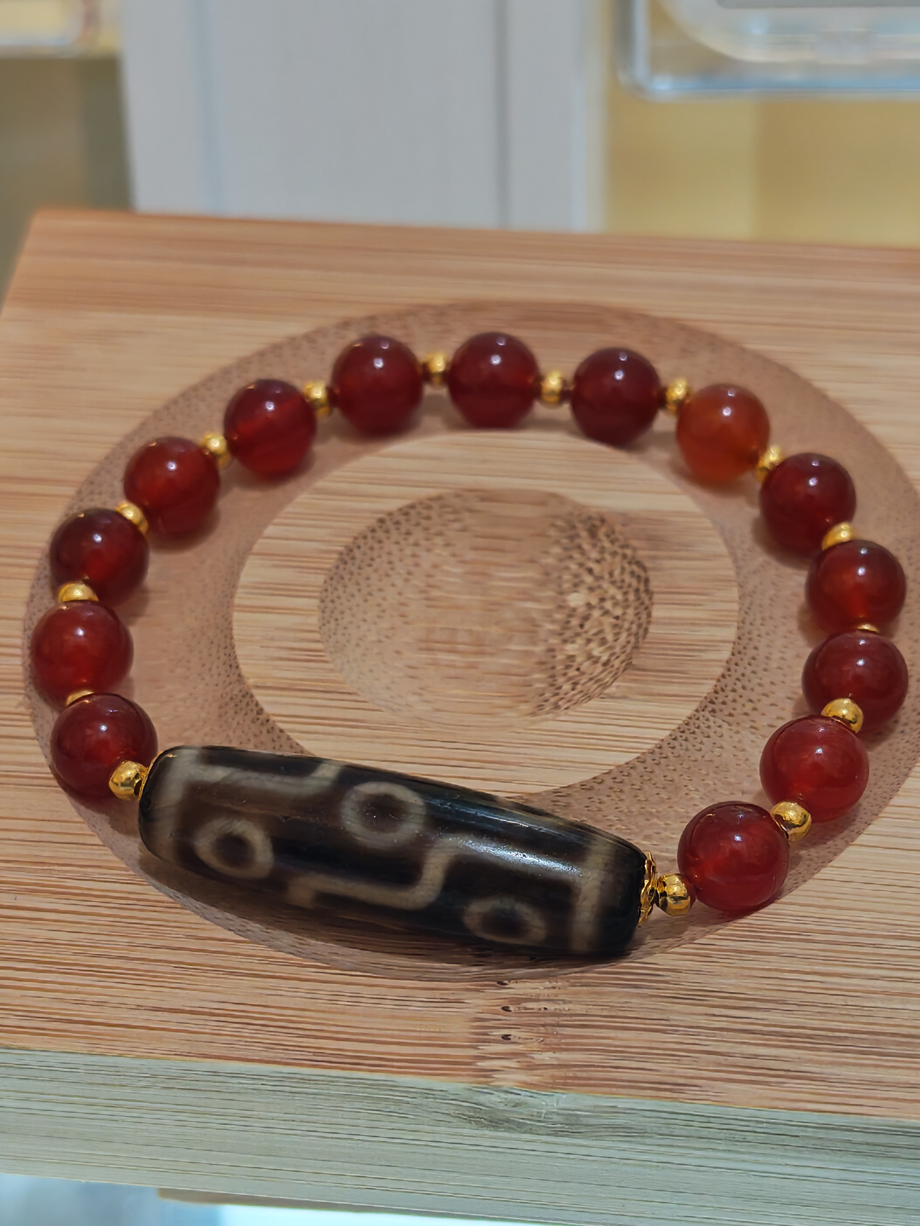 《牙黃九眼天珠》25035