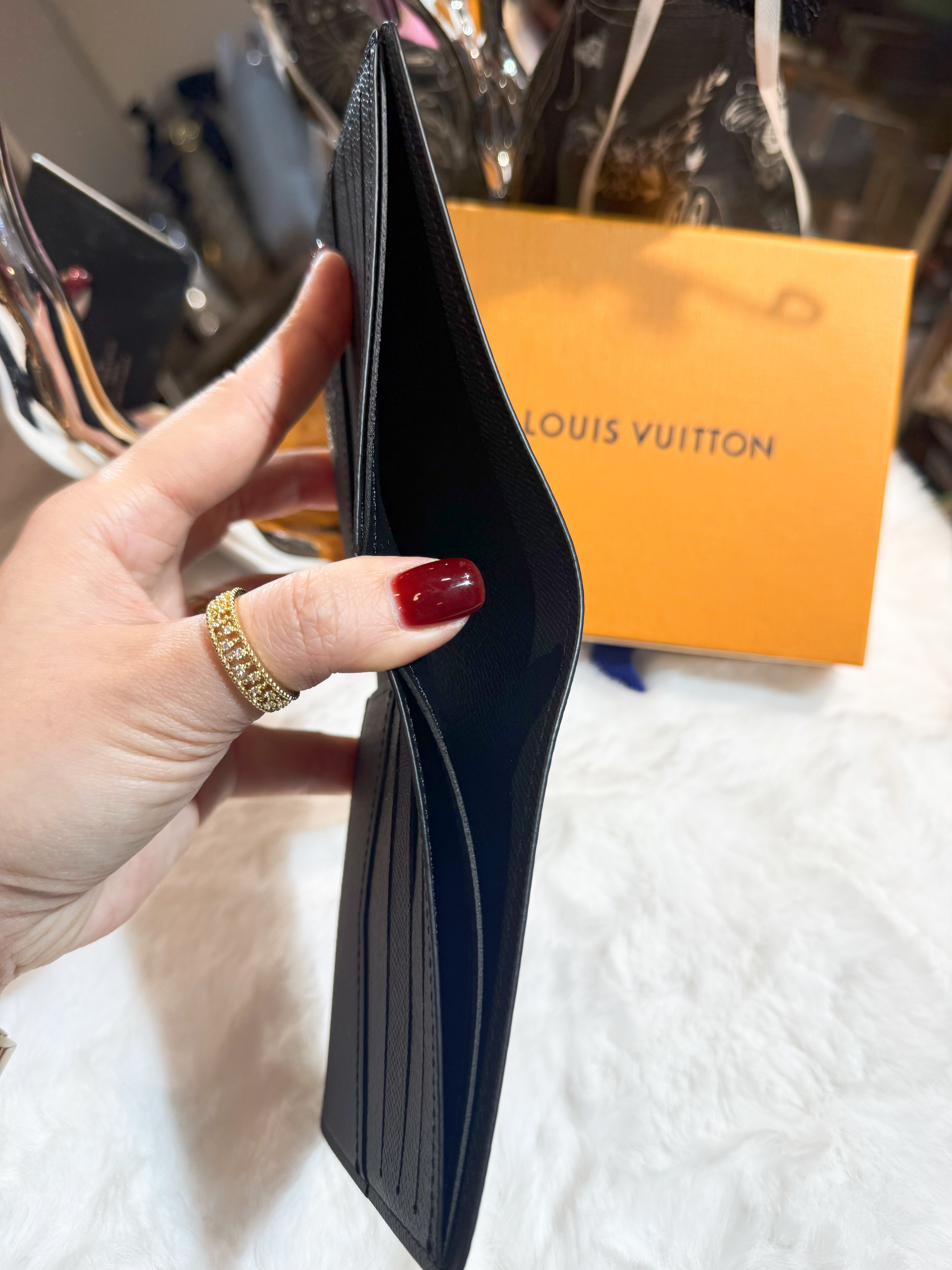 LV bi fold wallet 63261