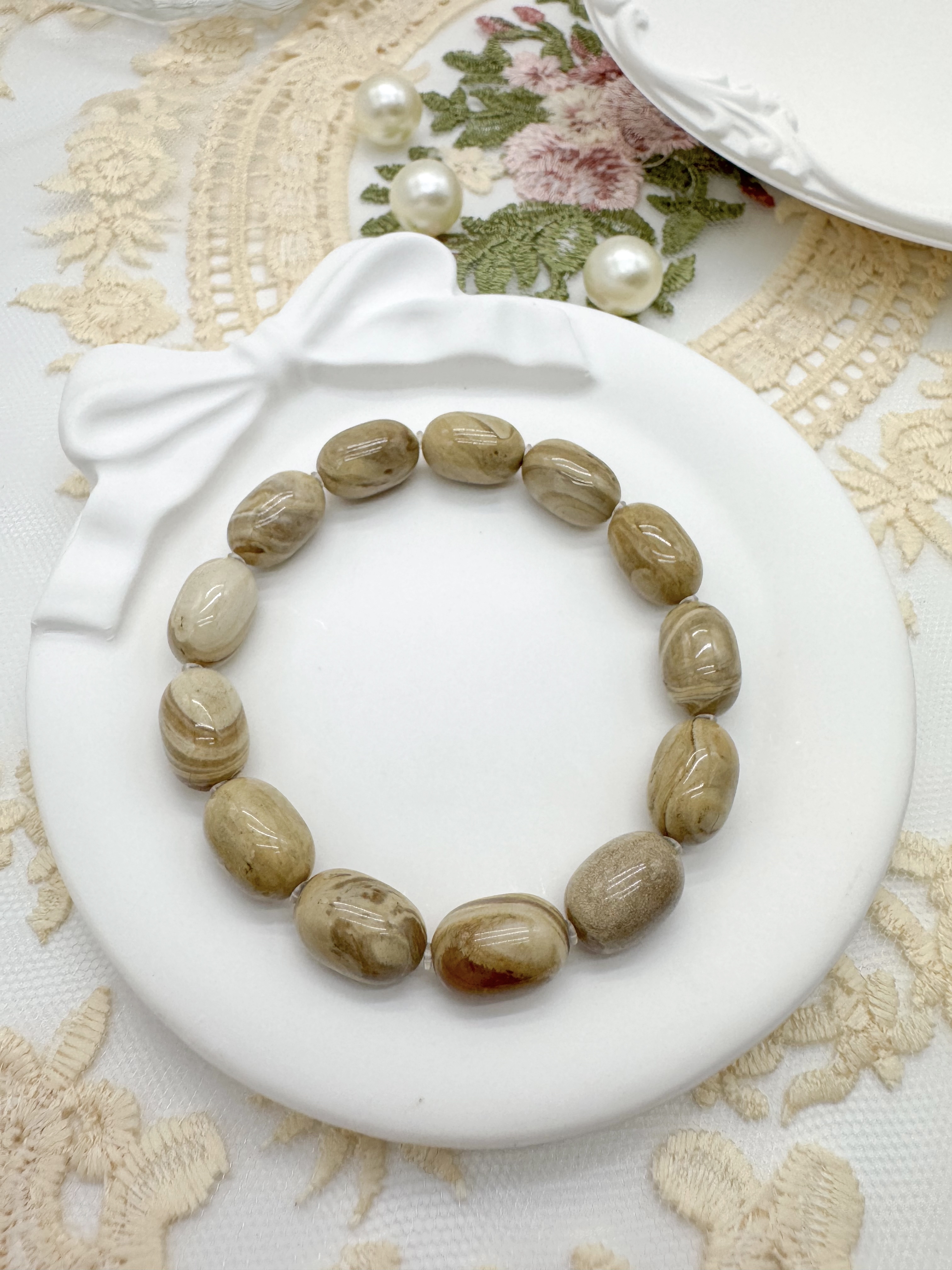 根溶洞橢圓珠手鍊(8+mm)