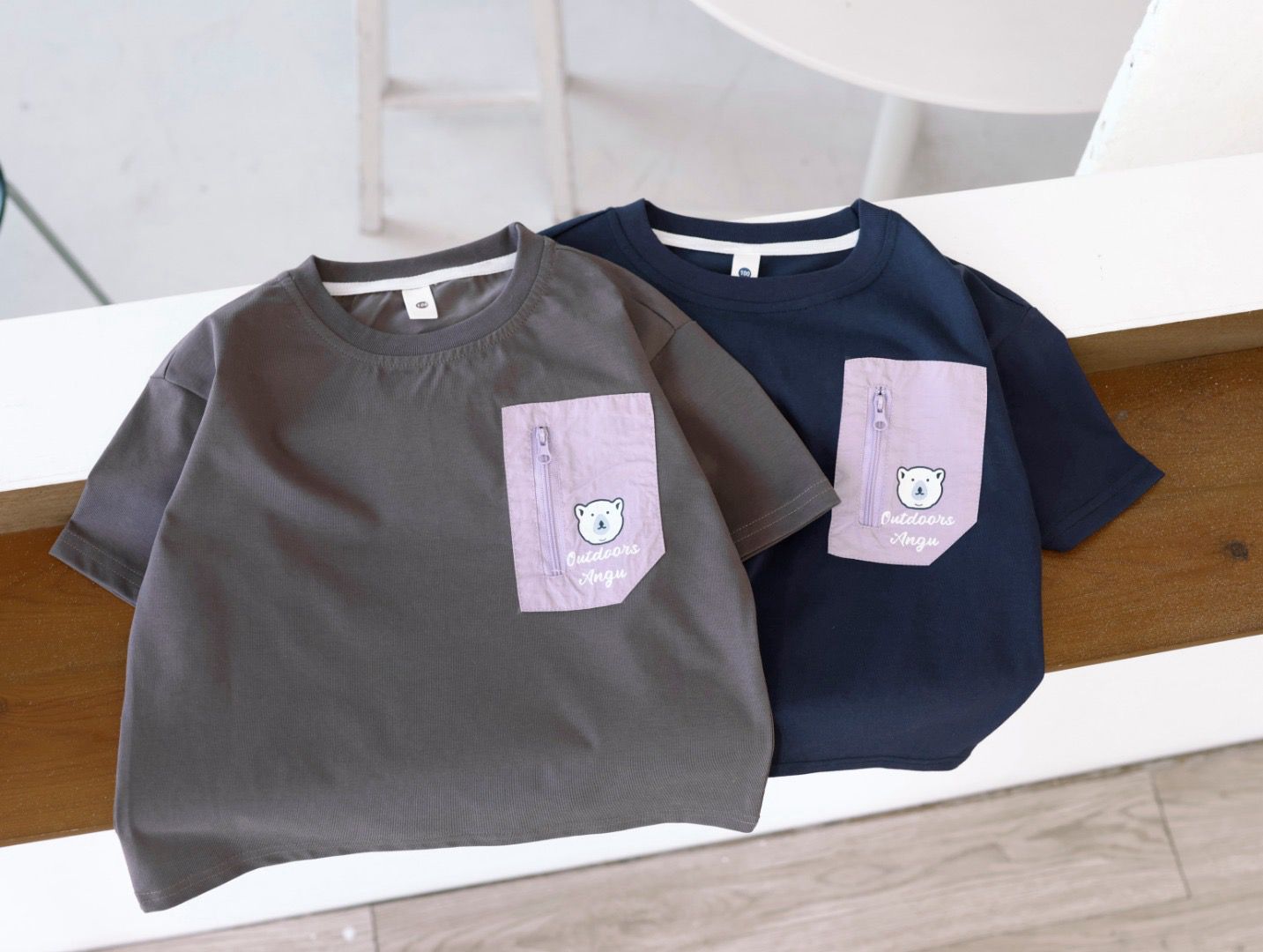 $75件。2件起$65件。山系卡通口袋休閒短袖