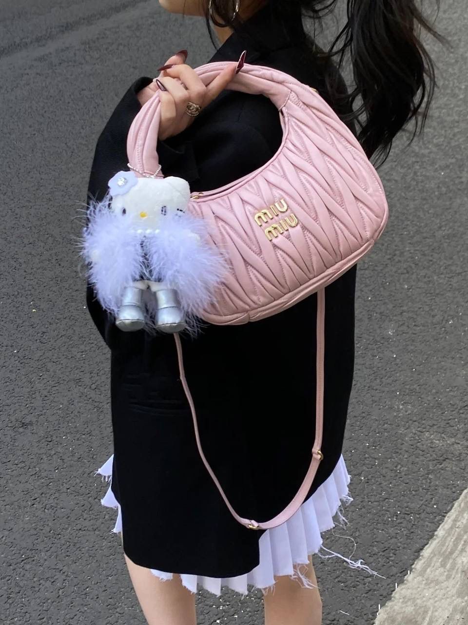 Miu Miu Quilted Leather Handbag: Chic and Versatile Designer Bag