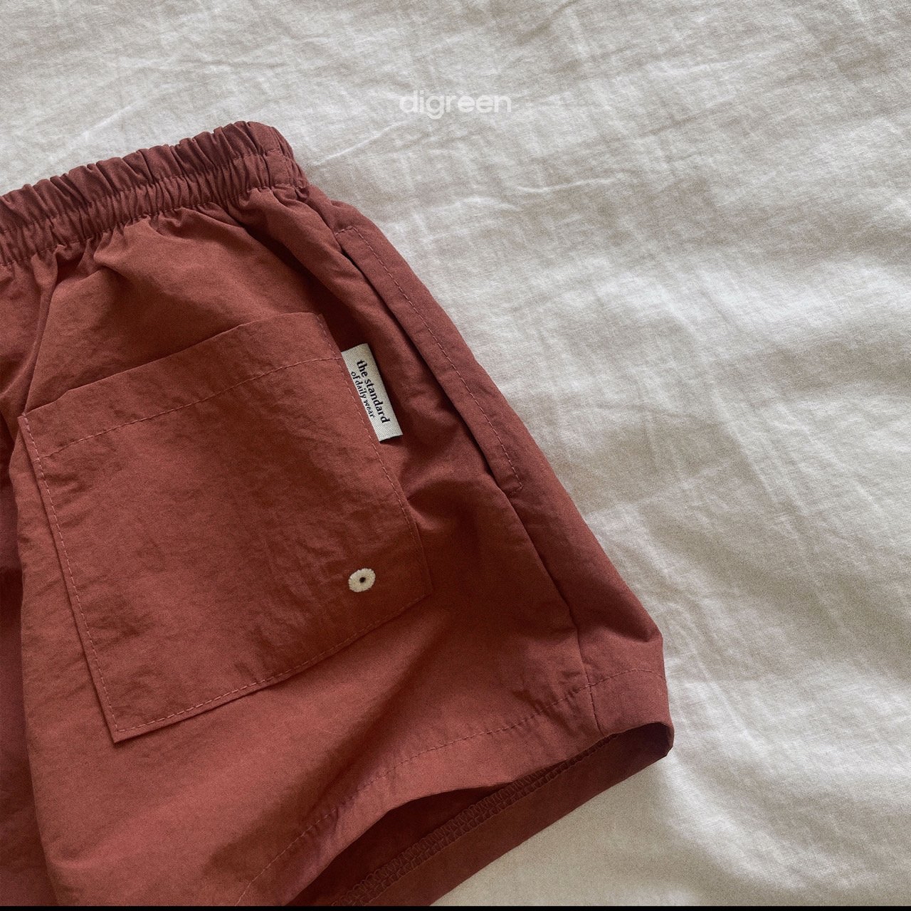 Digreen | eyelet swim pants 