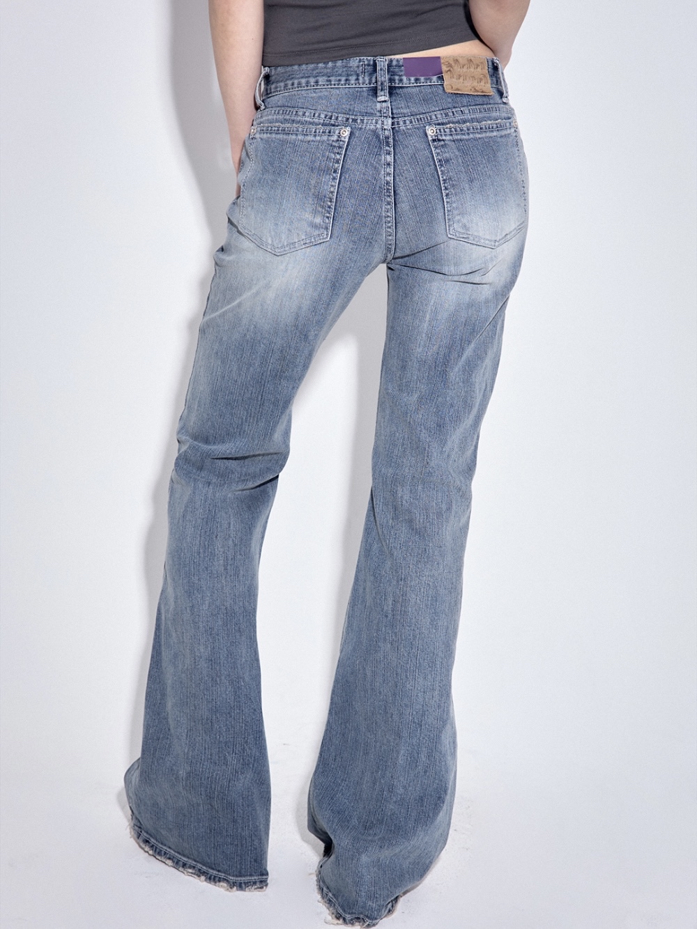 Low-Rise Distressed Bootcut Denim