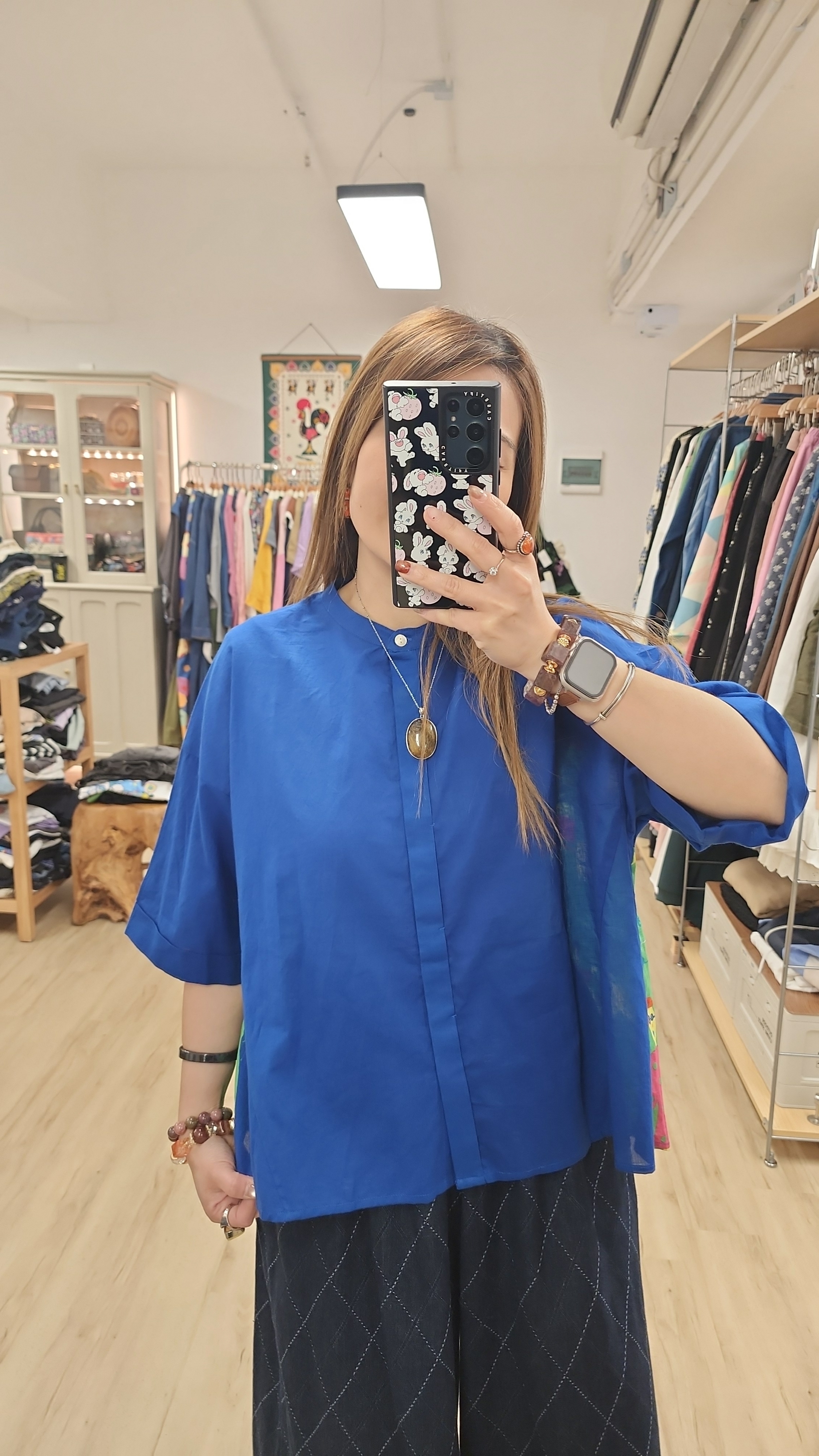 日牌藍拼背公仔圖案開胸裇