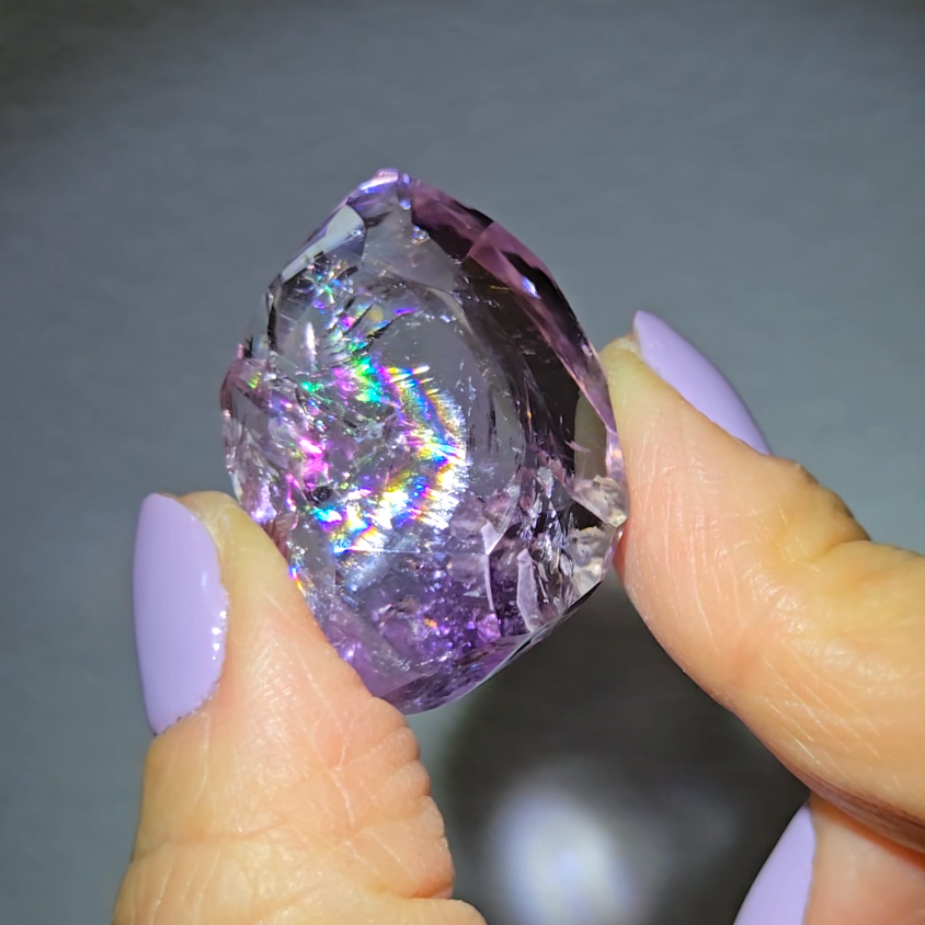 Amethyst pocket stone with rainbows - AM65