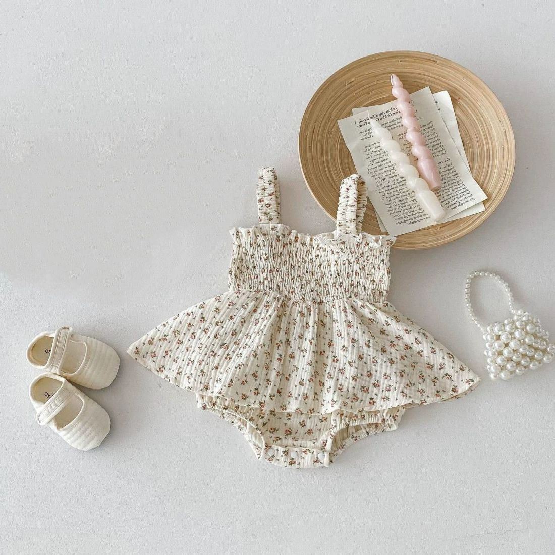 561613 | Floral Smocked Baby Romper with Ruffle Skirt