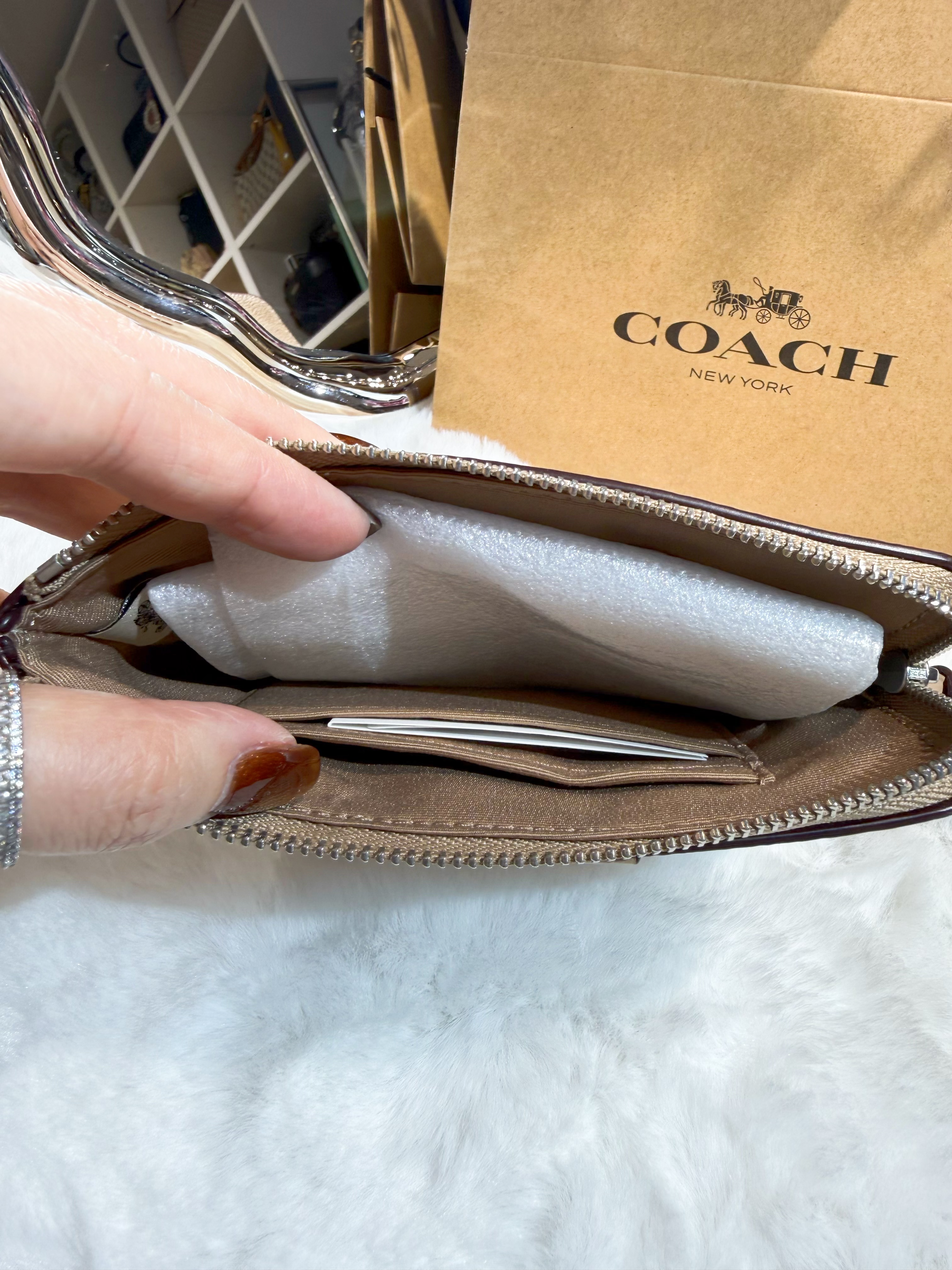 Coach wristlet  milk tea/m
