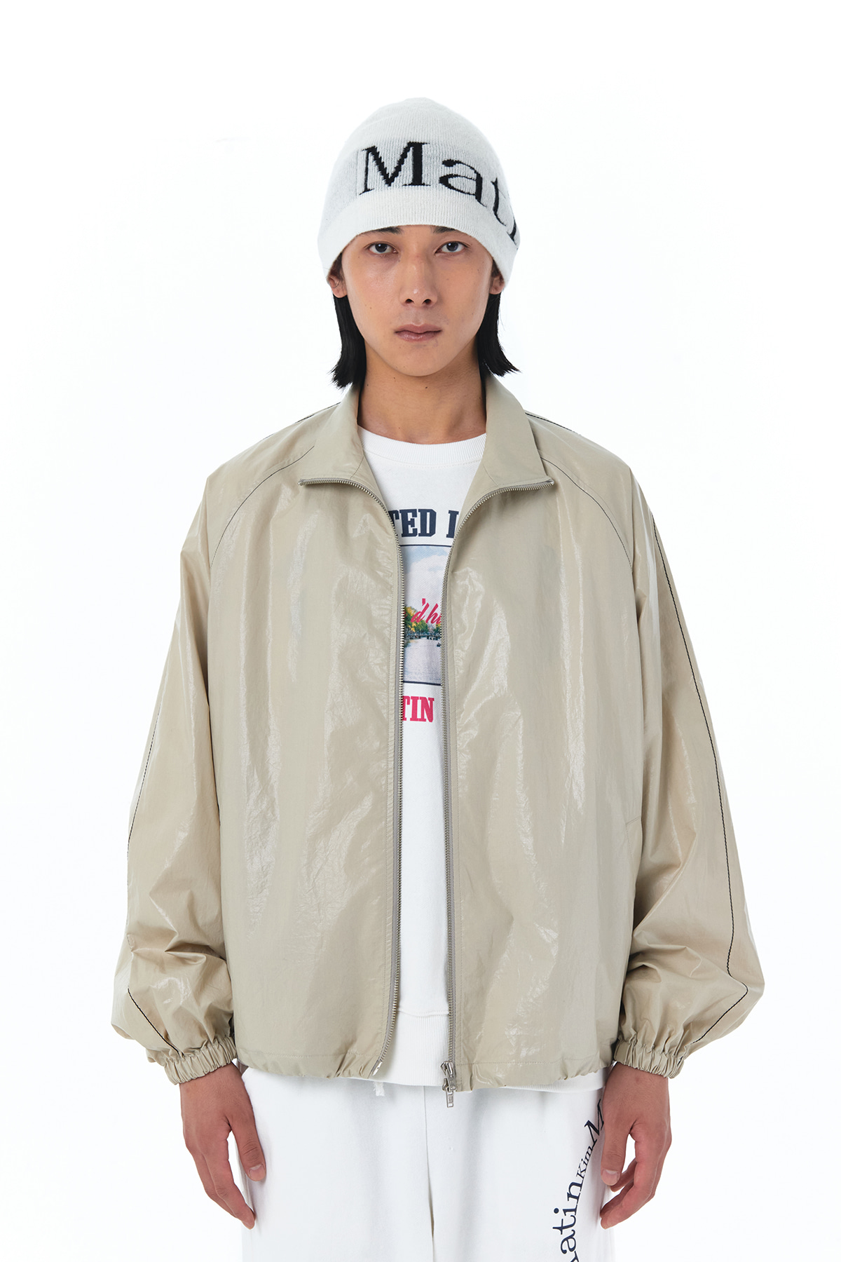 MATIN KIM LOGO COATING JUMPER IN BEIGE | KAZUE