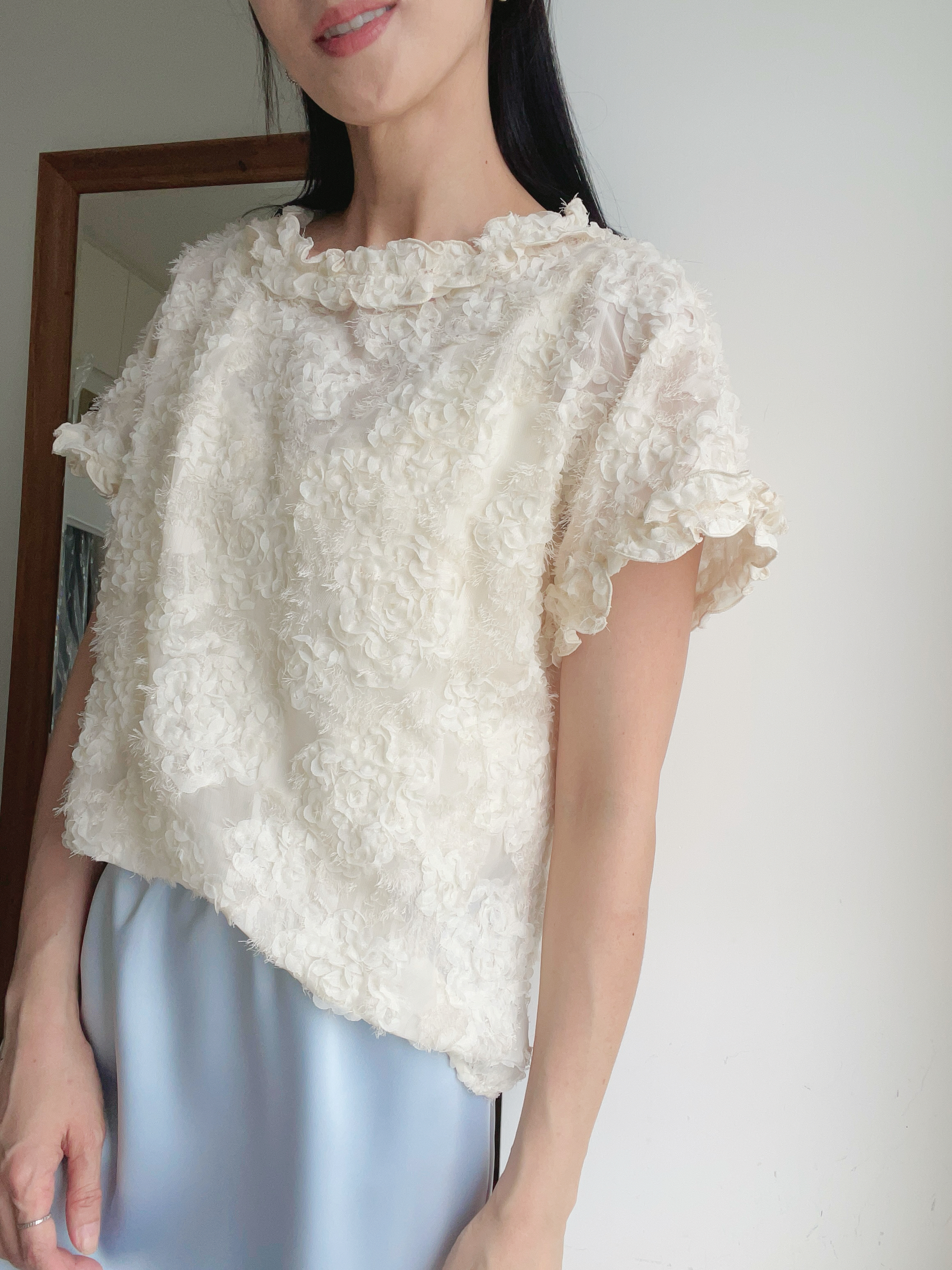 Feminine textured flower blouse