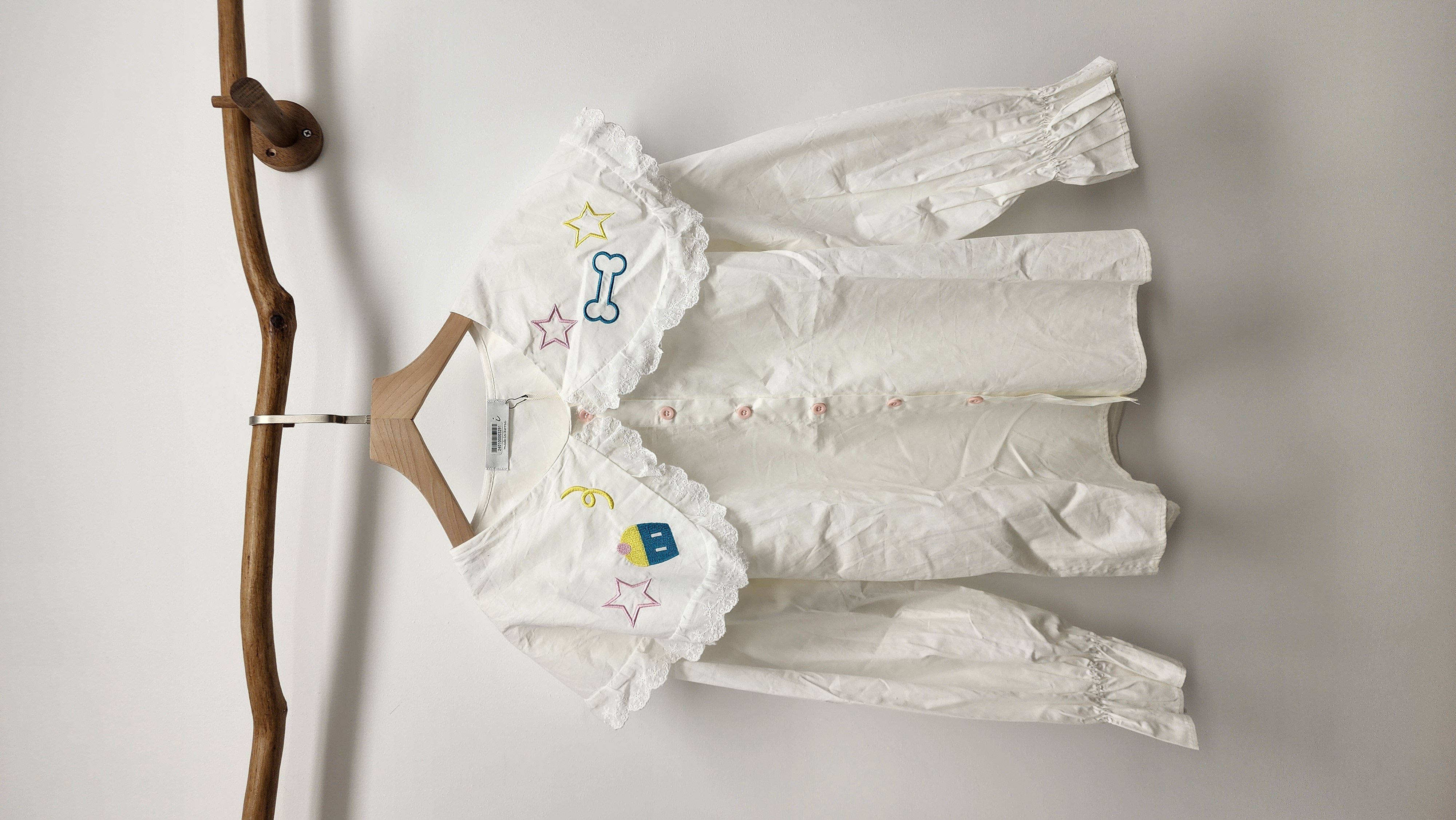 韓國白拼刺繡圖案娃娃領開胸裇