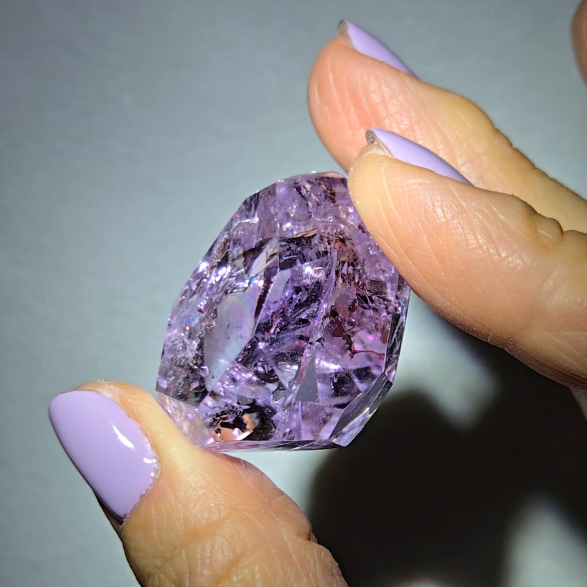 Amethyst pocket stone with rainbows and clarity - AM67