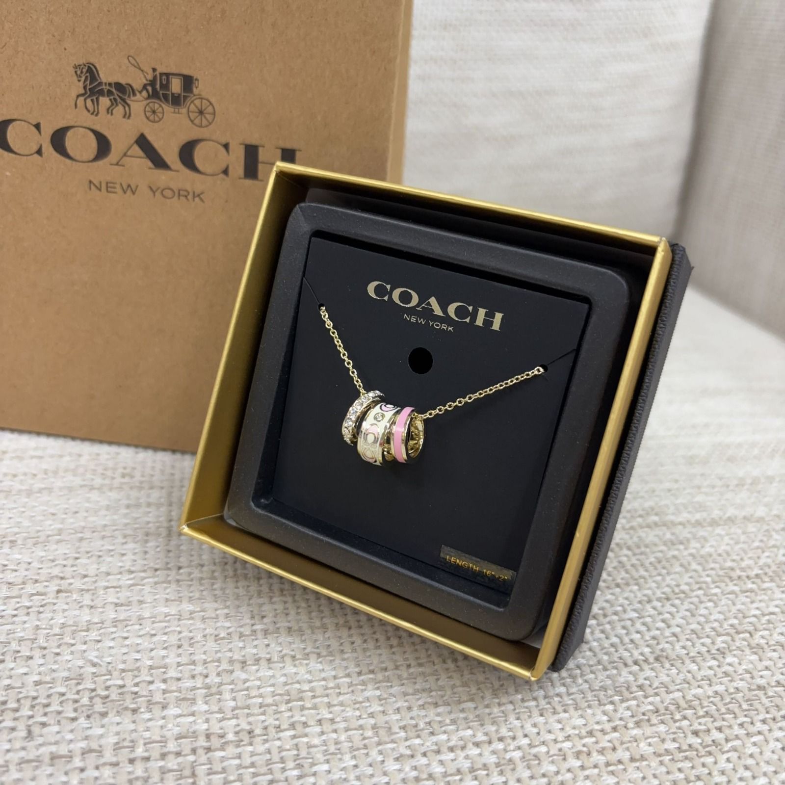 Coach最新款三環頸鏈(粉紅色併白色)