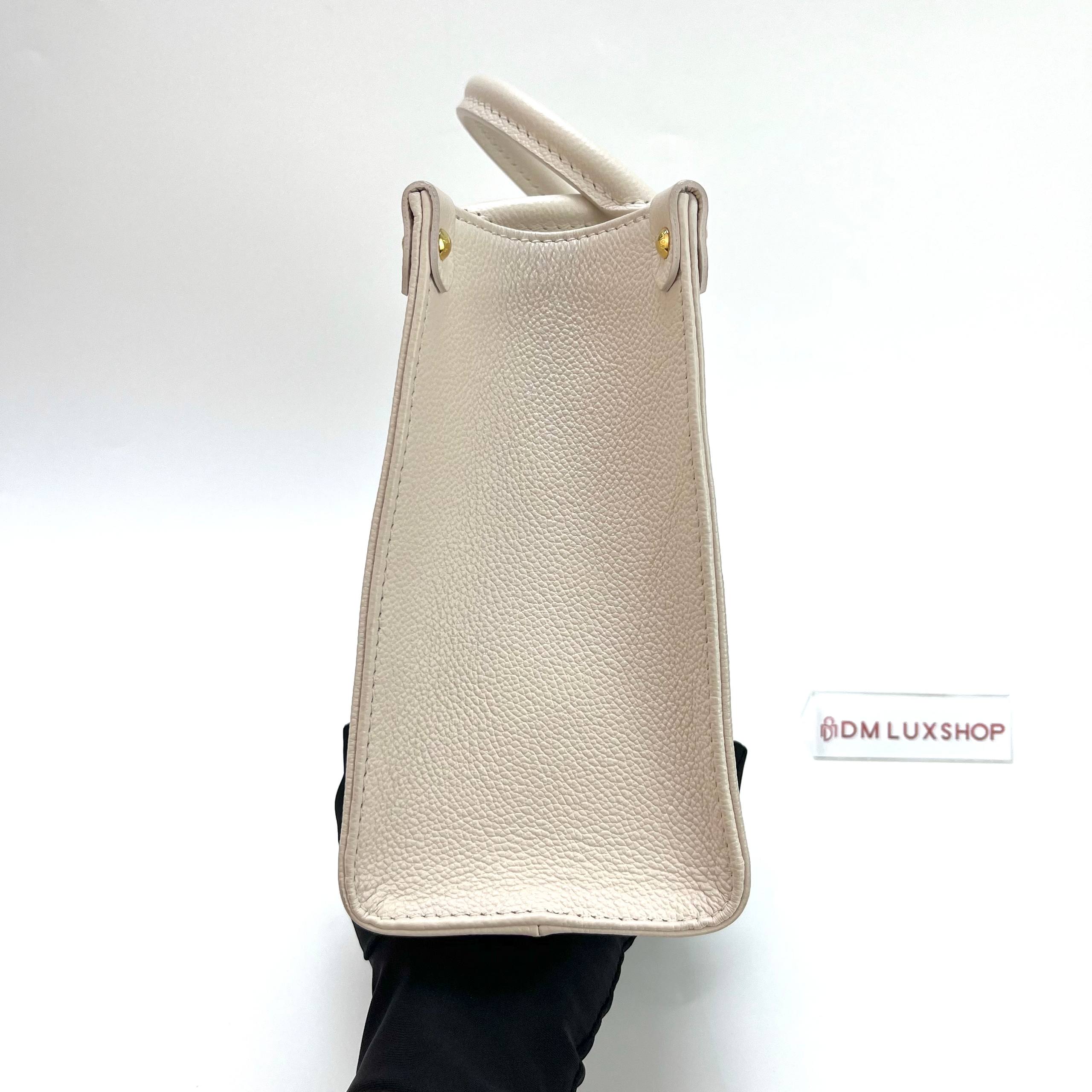 LV OnTheGo Beige Monogram Empreinte PM GHW
