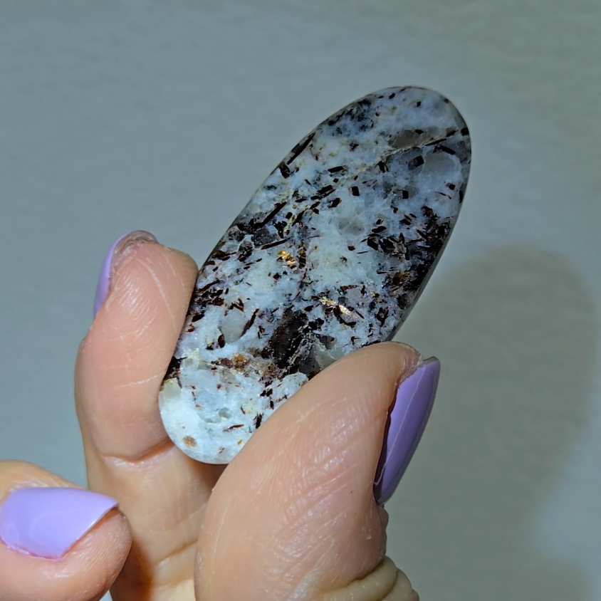 Astrophyllite cabochon with copper-colored inclusions - AST8