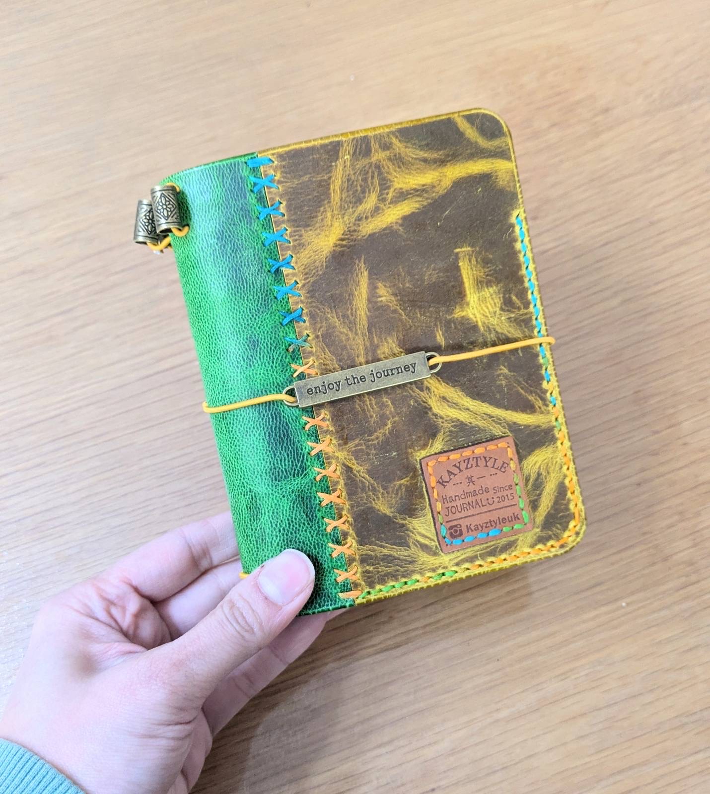 The Traveler’s Duo-Tone Hand-stitched Journal 