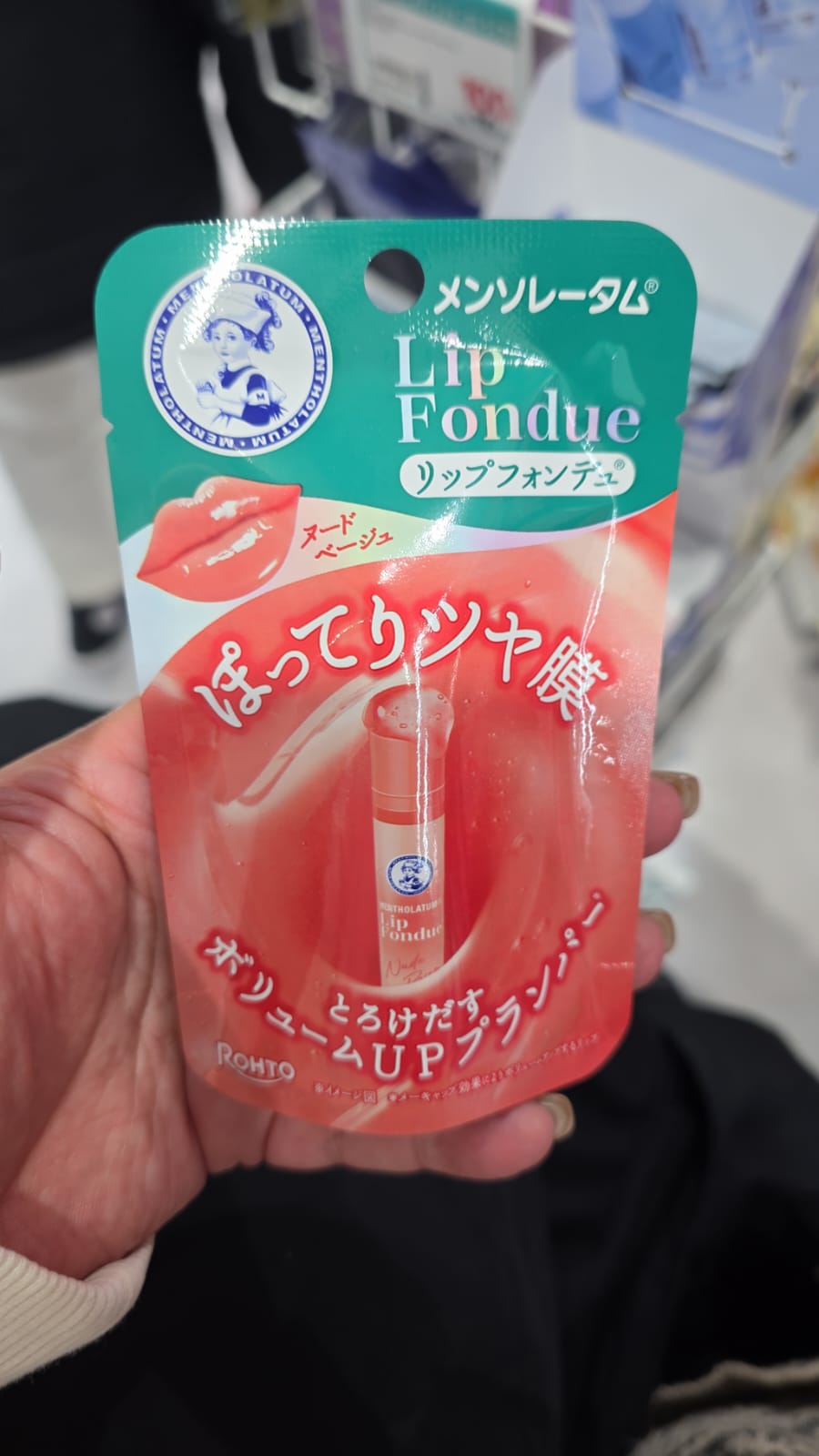 曼秀雷敦Lip Fondue 豐潤水光護唇膏，色號為裸米色