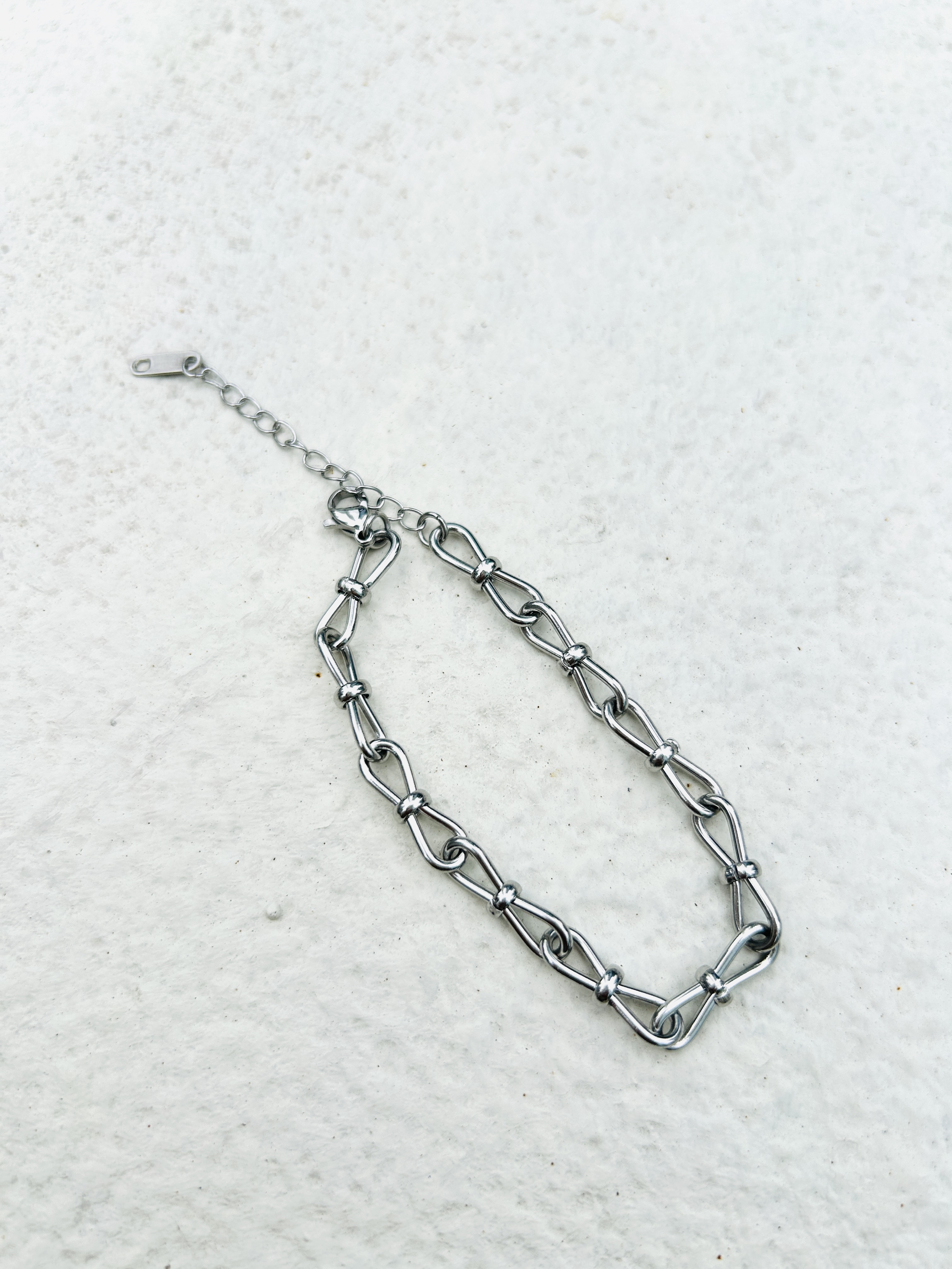 Silver bow stainless bracelet