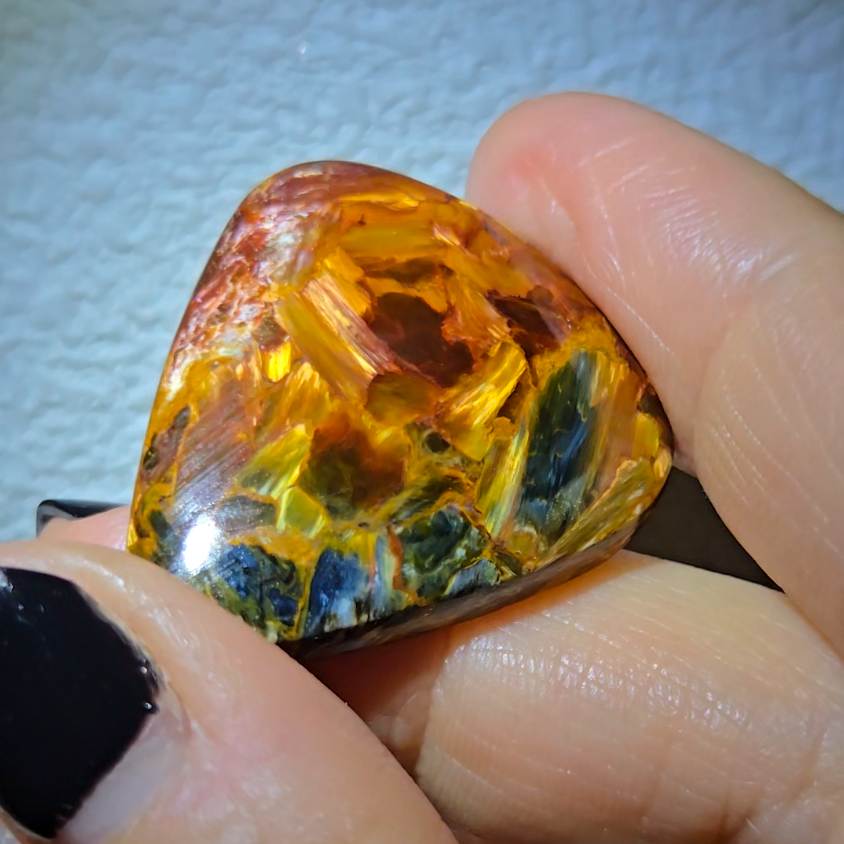 Red, gold, and blue pietersite cabochon - PT10